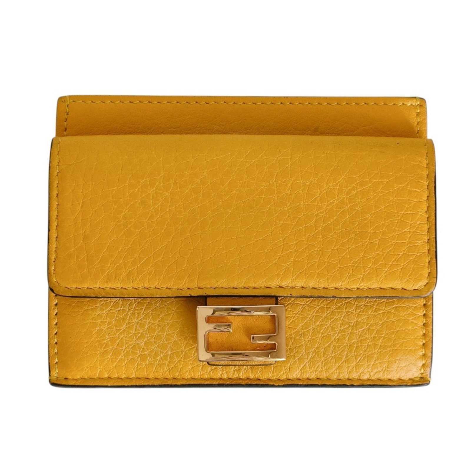 Fendi wallet bi fold leather: Fendi wallet bi fold leather Yellow Fendi bi-fold leather wallet with precise measurements and luxurious material. This stylish accessory boasts a sleek design, measuring 8cm x 10.2cm x 5.00mm in size