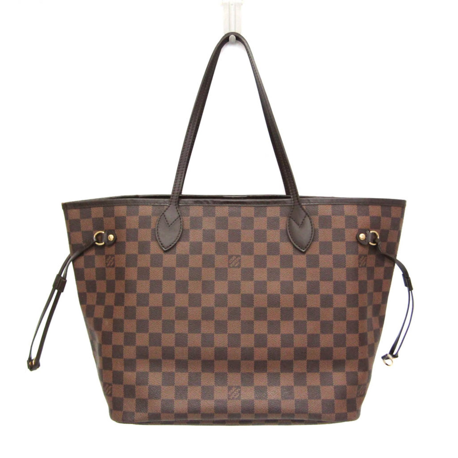 Damier Canvas Tote Bag by Louis Vuitton: Damier Canvas Tote Bag by Louis Vuitton Damier Canvas Tote Bag by Louis Vuitton features a classic design with a signature Damier pattern, crafted from high-quality Damier canvas. The bag boasts a