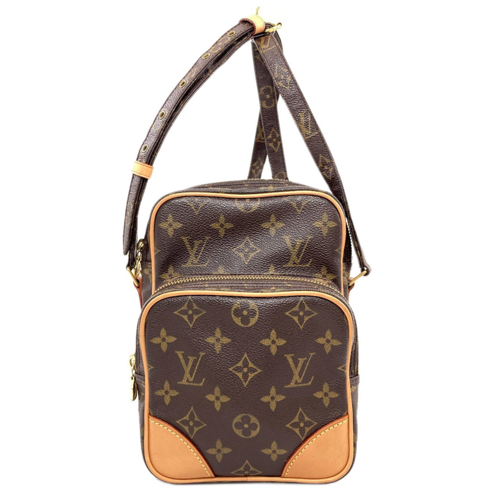 Shoulder Bag Monogram Canvas by Louis Vuitton: Shoulder Bag Monogram Canvas by Louis Vuitton Monogram canvas shoulder bag by Louis Vuitton, featuring the iconic brown monogram pattern. This stylish and compact bag measures 21cm x 15cm x 9cm,