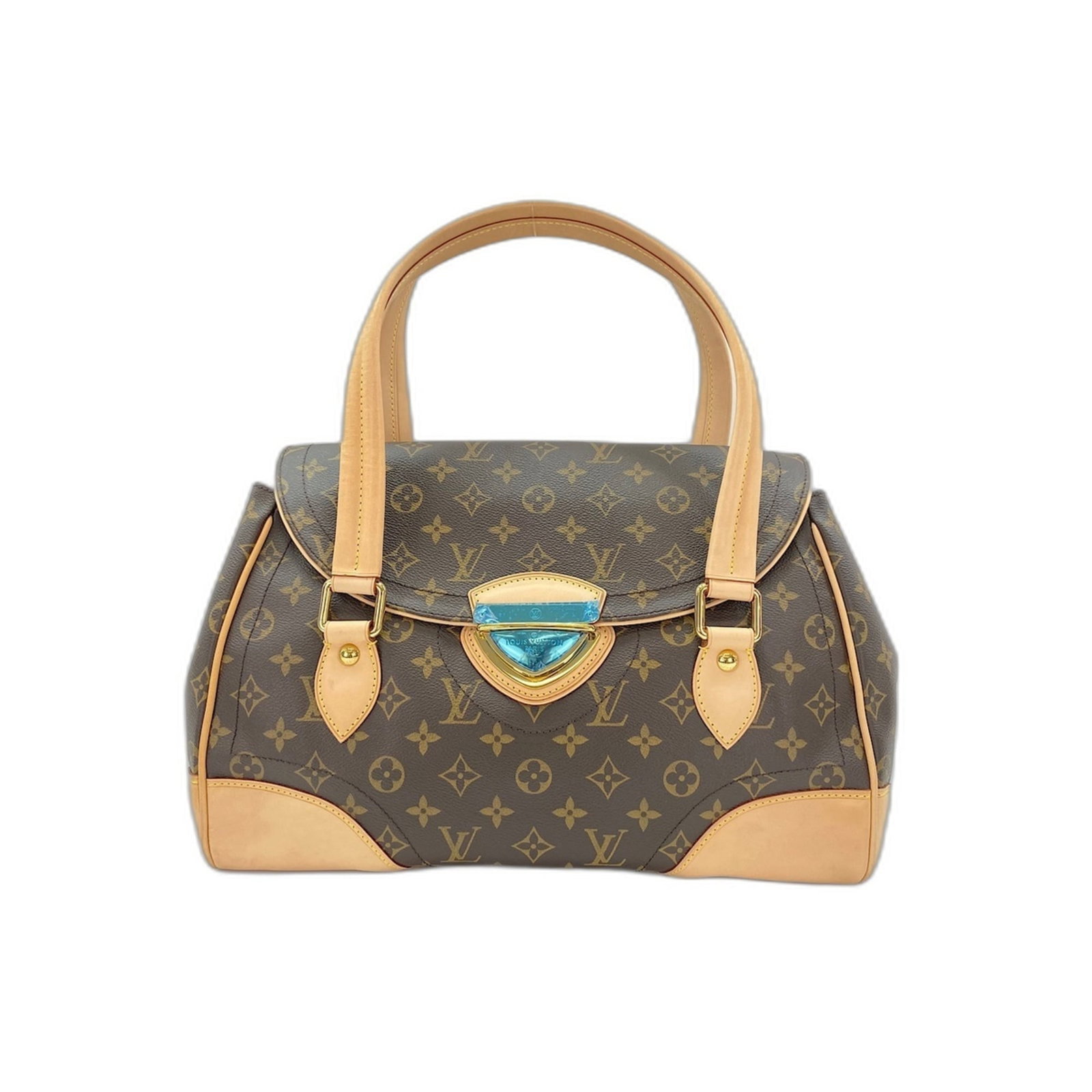 Louis Vuitton Handbag Monogram: Louis Vuitton Handbag Monogram Brown Louis Vuitton Monogram Handbag. Made in France, this handbag features the iconic monogram pattern and measures 27cm x 33cm x 11cm. A classic design from a