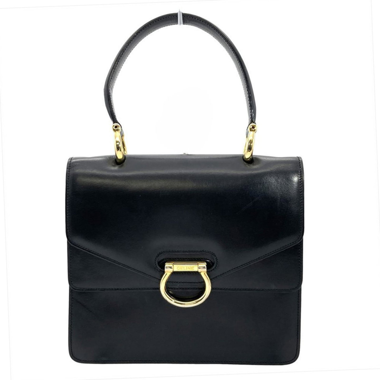 Handbag Celine Leather: Handbag Celine Leather Black Celine Leather Handbag. Made from high-quality Italian leather, this sleek and sophisticated handbag measures 19.5cm x 21.5cm x 4.5cm. Its classic design makes it a timele