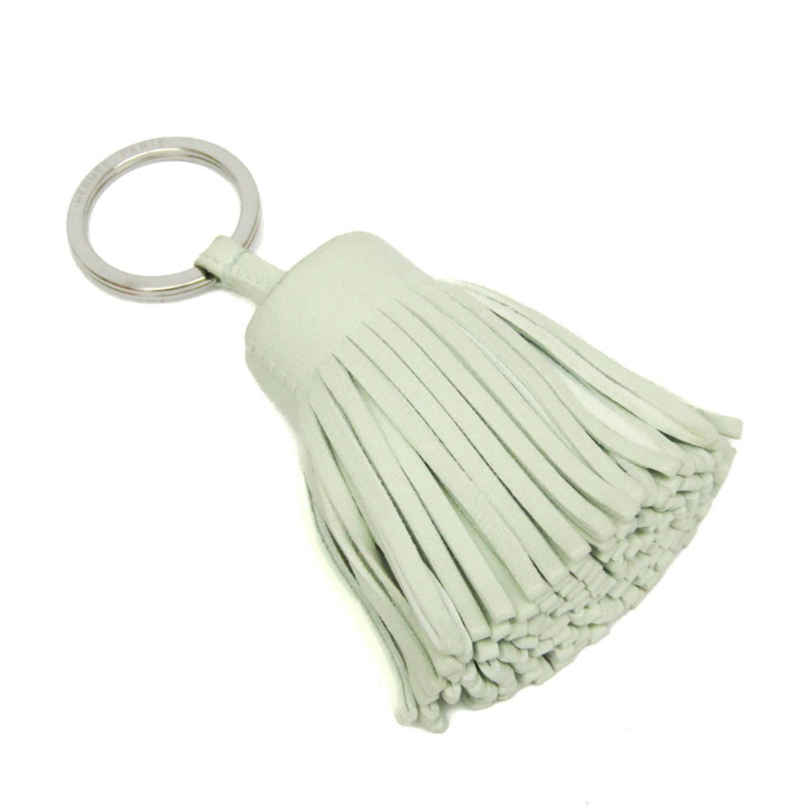Milo Agneau Keyring Hermes: Milo Agneau Keyring Hermes Agneau Milo Keyring from the iconic Hermes Carmen line, crafted in France with a light green agneau Milo material. This stylish keyring features a charming design and measur