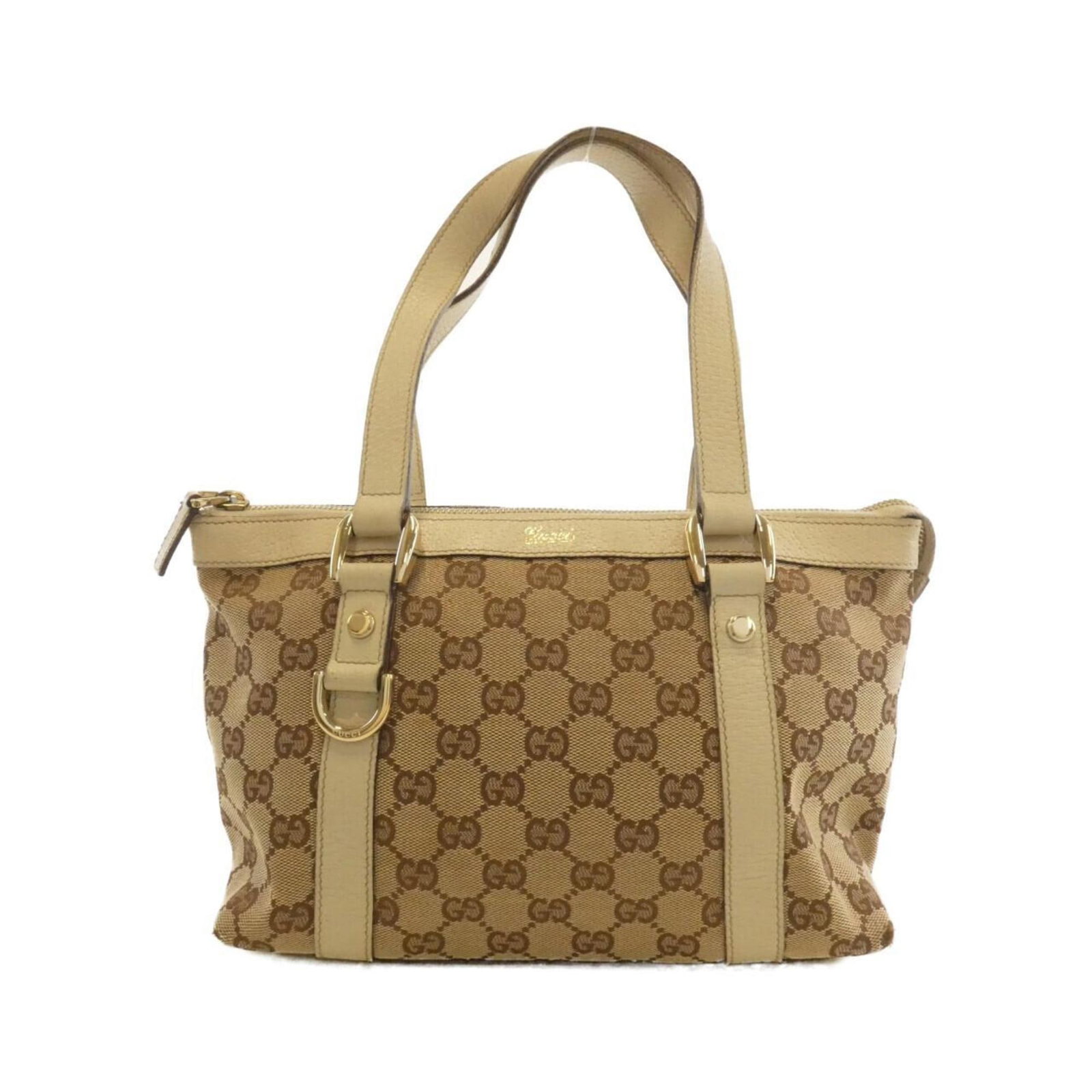Gucci Handbag Gg Canvas: Gucci Handbag Gg Canvas Gucci's iconic GG Canvas handbag boasts a timeless beige and ivory color combination, elevated by gold hardware accents. Measuring 17cm x 24cm x 10cm, this compact bag features