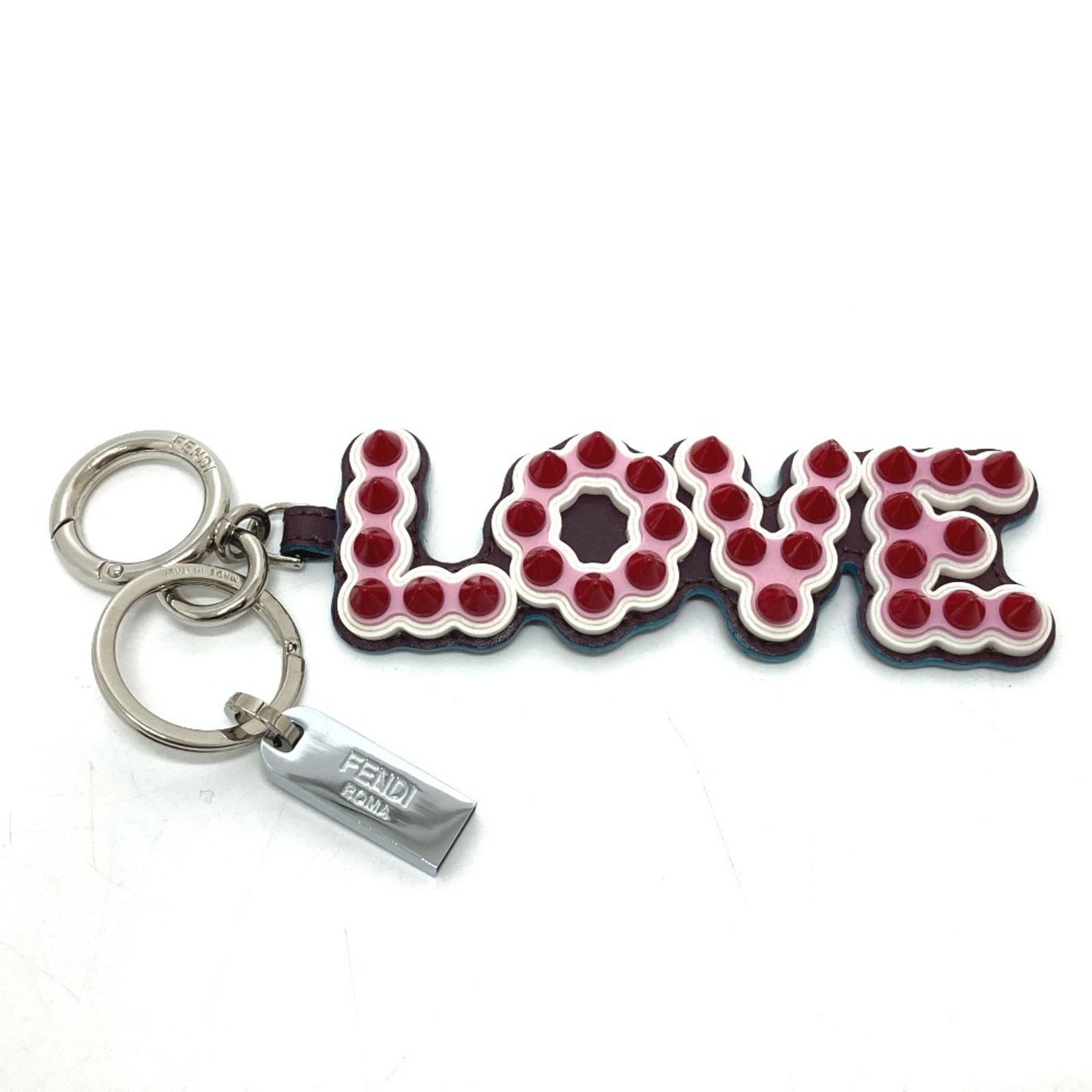 Keyring by Fendi: Keyring by Fendi Keyring by Fendi features a sleek design with a unique shape and size, measuring 6.9 inches in total length. Made from an other material, it boasts a distinctive look that sets it apa