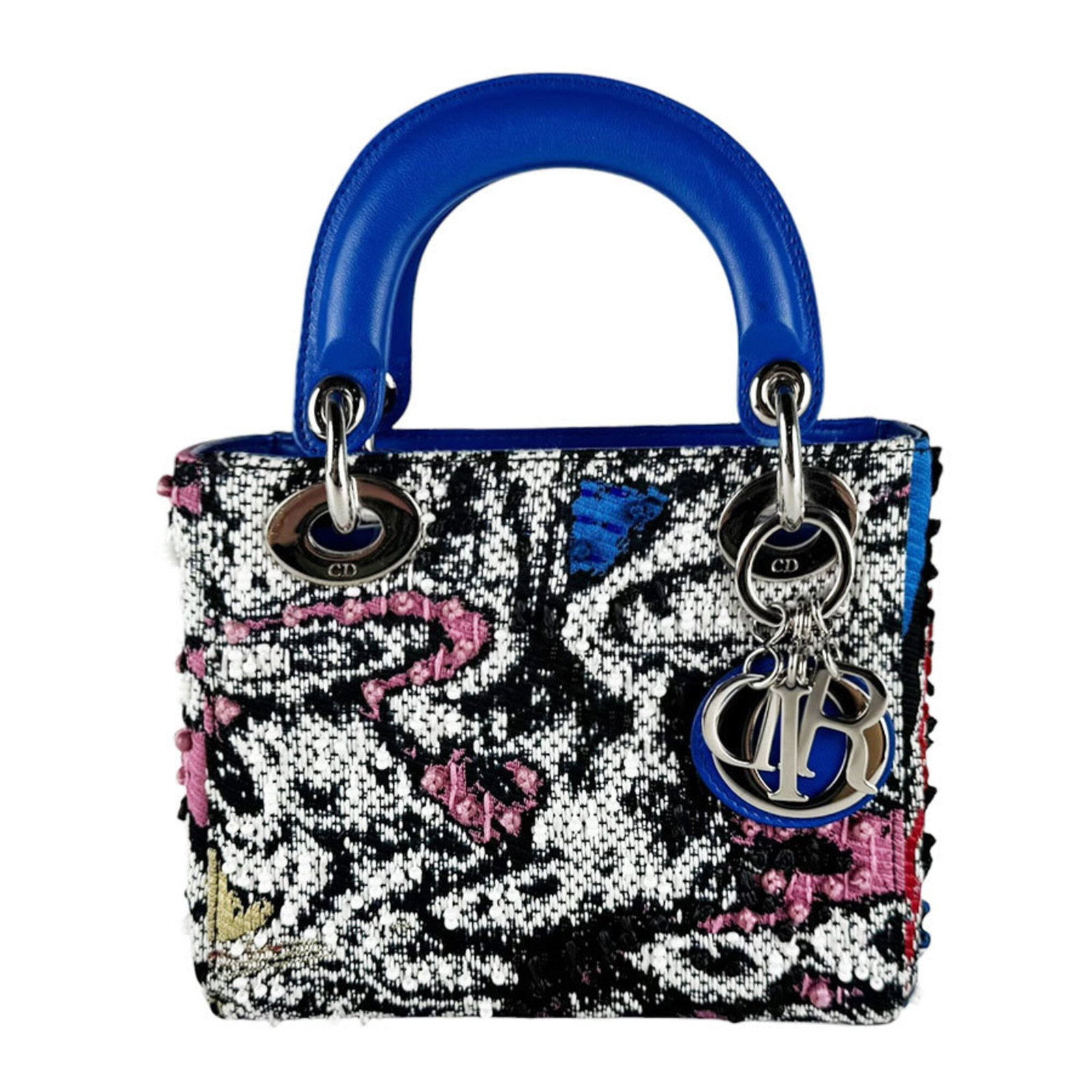 Handbag tweed leather beads shoulder bag Christian Dior: Handbag tweed leather beads shoulder bag Christian Dior Tweed leather beads shoulder bag from Christian Dior, featuring a unique blend of tweed and leather materials with multi-color accents. This