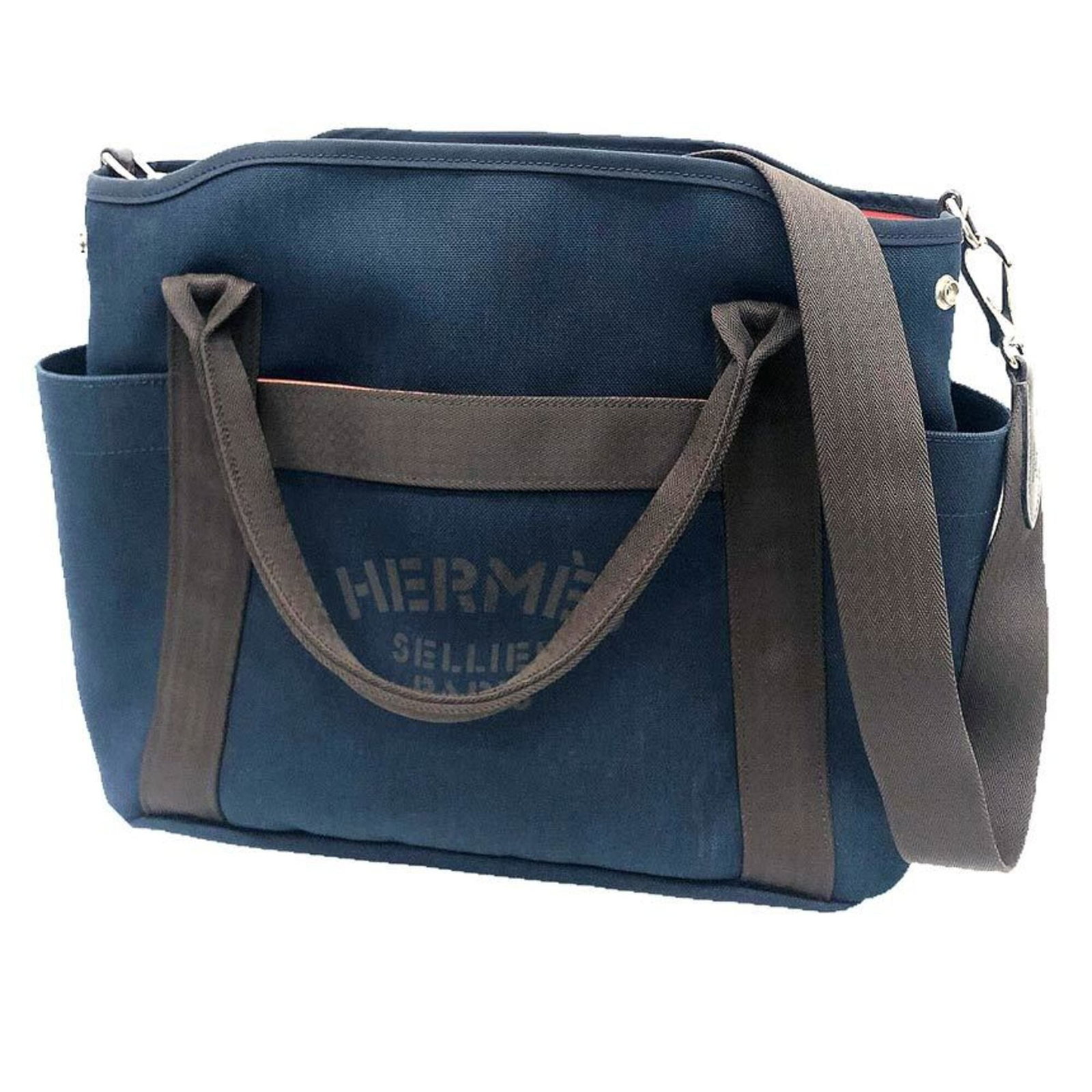 Hermes Shoulder Bag Tote Bag Canvas: Hermes Shoulder Bag Tote Bag Canvas Canvas tote bag from Hermes, featuring a classic brown and navy color combination. Made from high-quality canvas material, this shoulder bag measures 30.5cm x 43cm