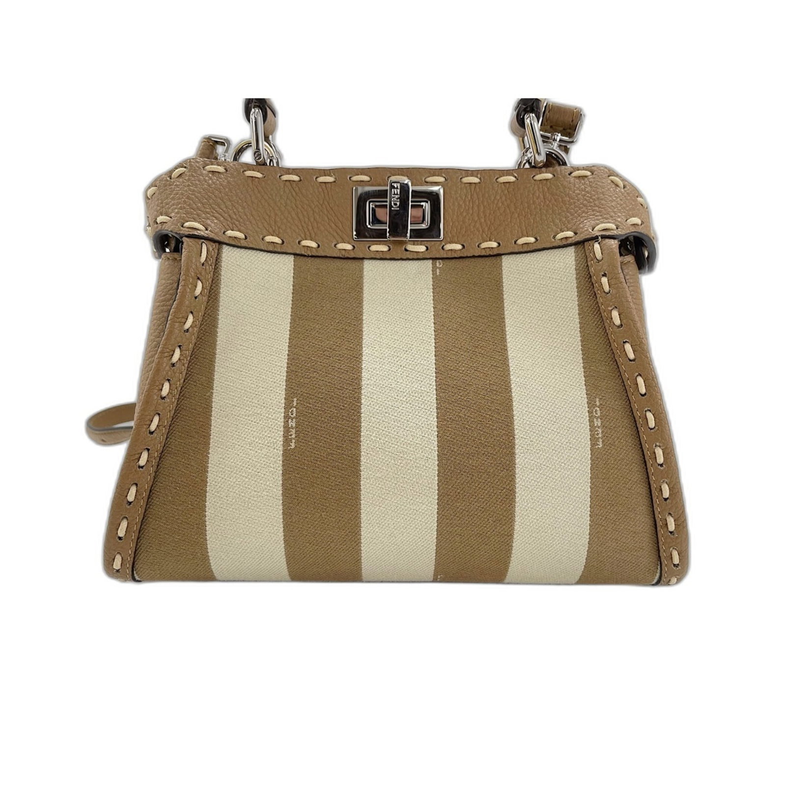 Fendi Handbag: Fendi Handbag Beige Fendi Handbag with Clear Accents, Measuring 19cm x 23cm x 9cm. This stylish handbag features a sleek design and clear accents that add a touch of sophistication to any outfit. Its 
