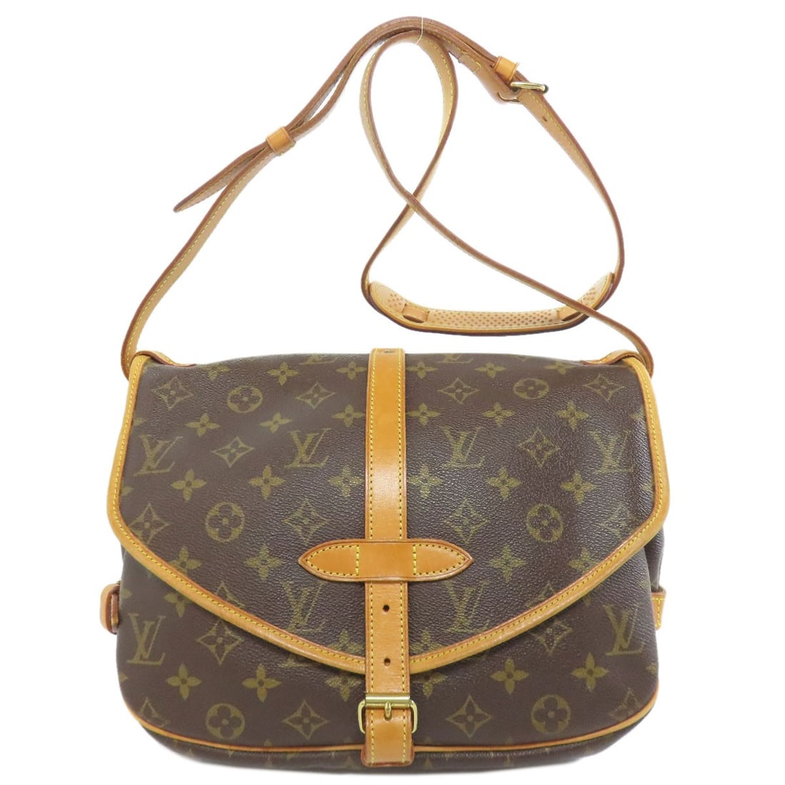 Canvas Monogram Saumur Louis Vuitton Mm M40710 Shoulder Bag: Canvas Monogram Saumur Louis Vuitton Mm M40710 Shoulder Bag Brown Monogram Canvas Louis Vuitton Shoulder Bag. This LOUIS VUITTON Mm M40710 shoulder bag features the iconic monogram canvas exterior in