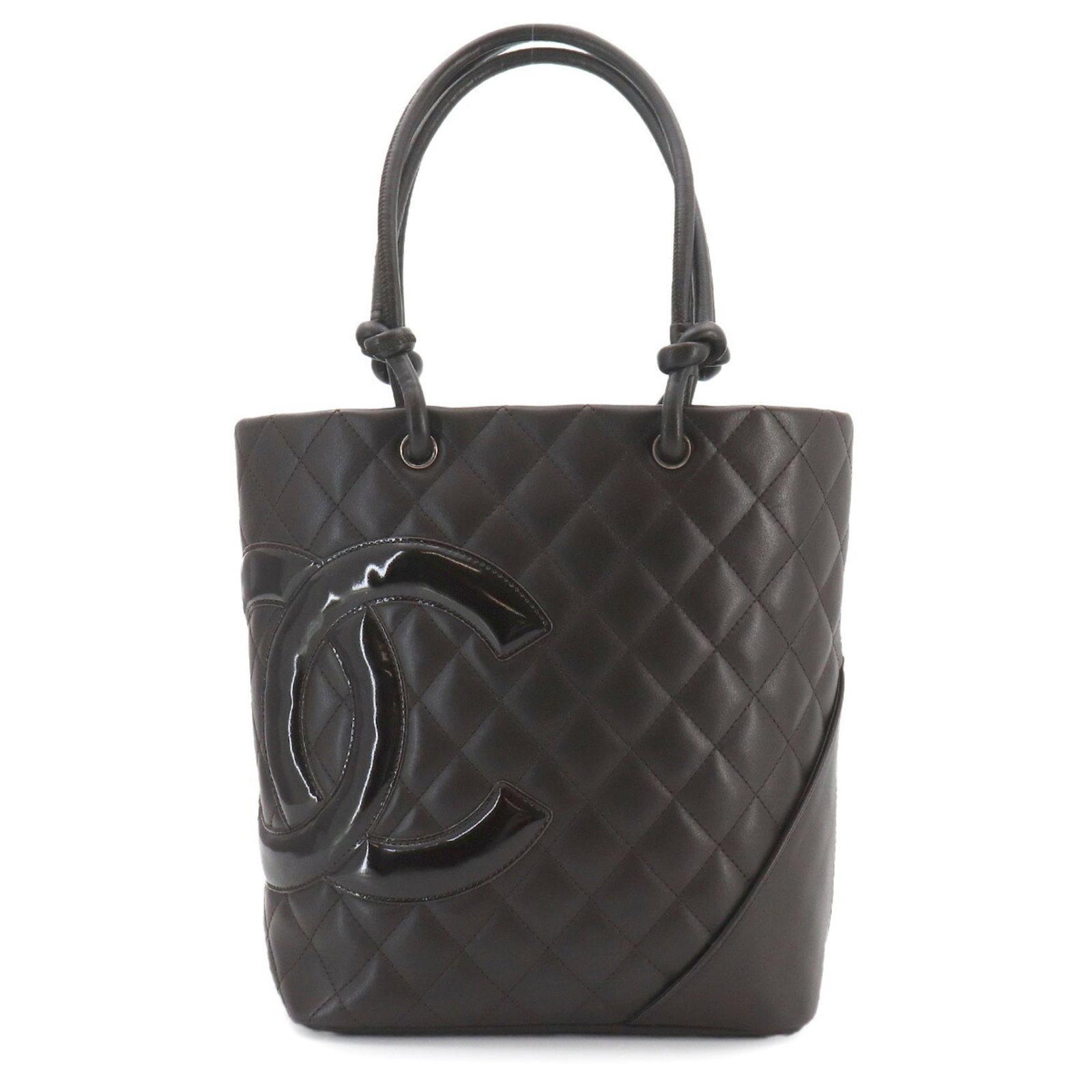Handbag tote leather bag Chanel: Handbag tote leather bag Chanel Brown Calfskin Leather, Enamel Details Adorn This Classic Chanel Tote Bag. Made from high-quality leather and featuring iconic Chanel enamel accents, this timeless