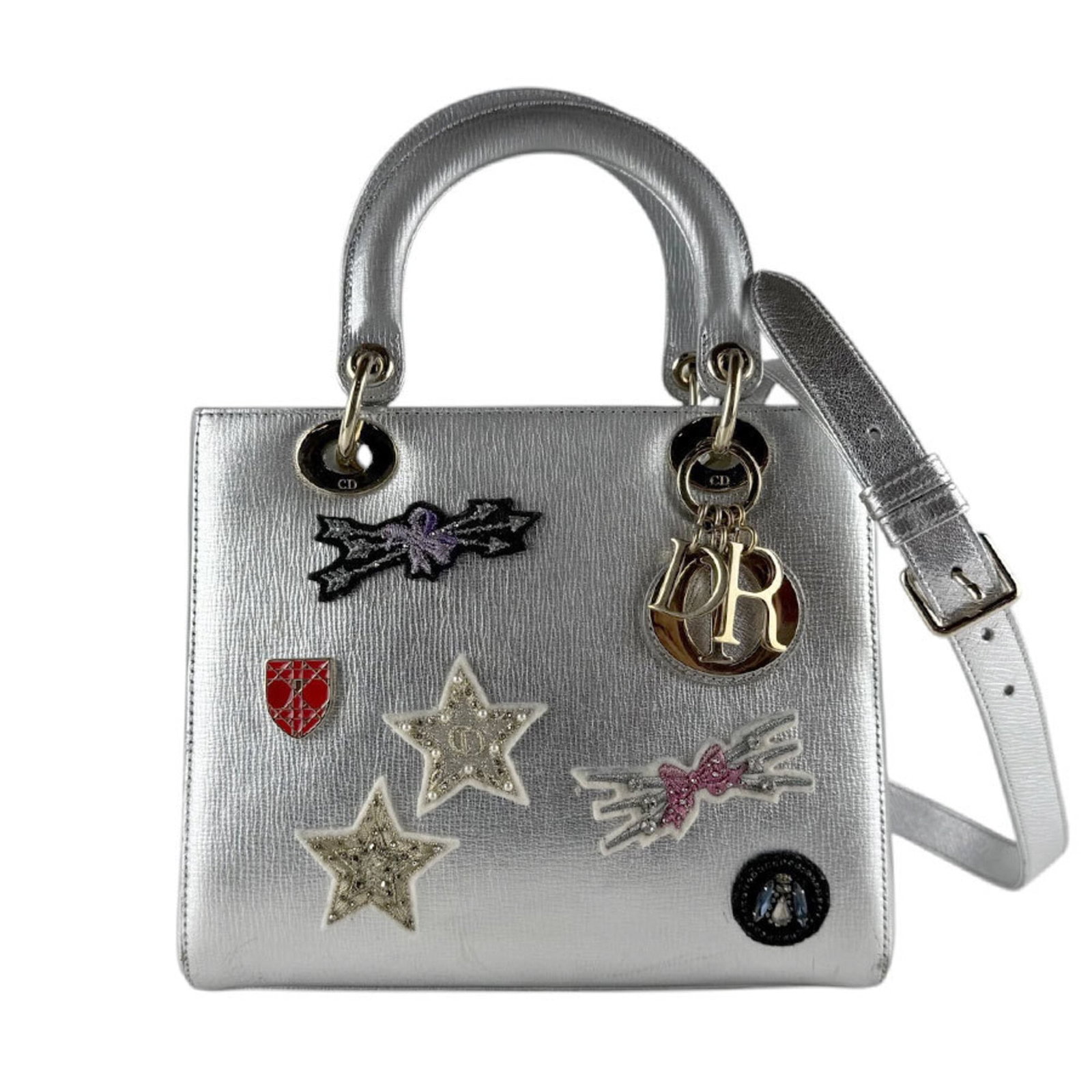 Handbag Shoulder Christian Dior Leather: Handbag Shoulder Christian Dior Leather Handbag Shoulder Christian Dior Leather, made from high-quality leather and featuring a unique multi-color design with silver accents. This stylish shoulder
