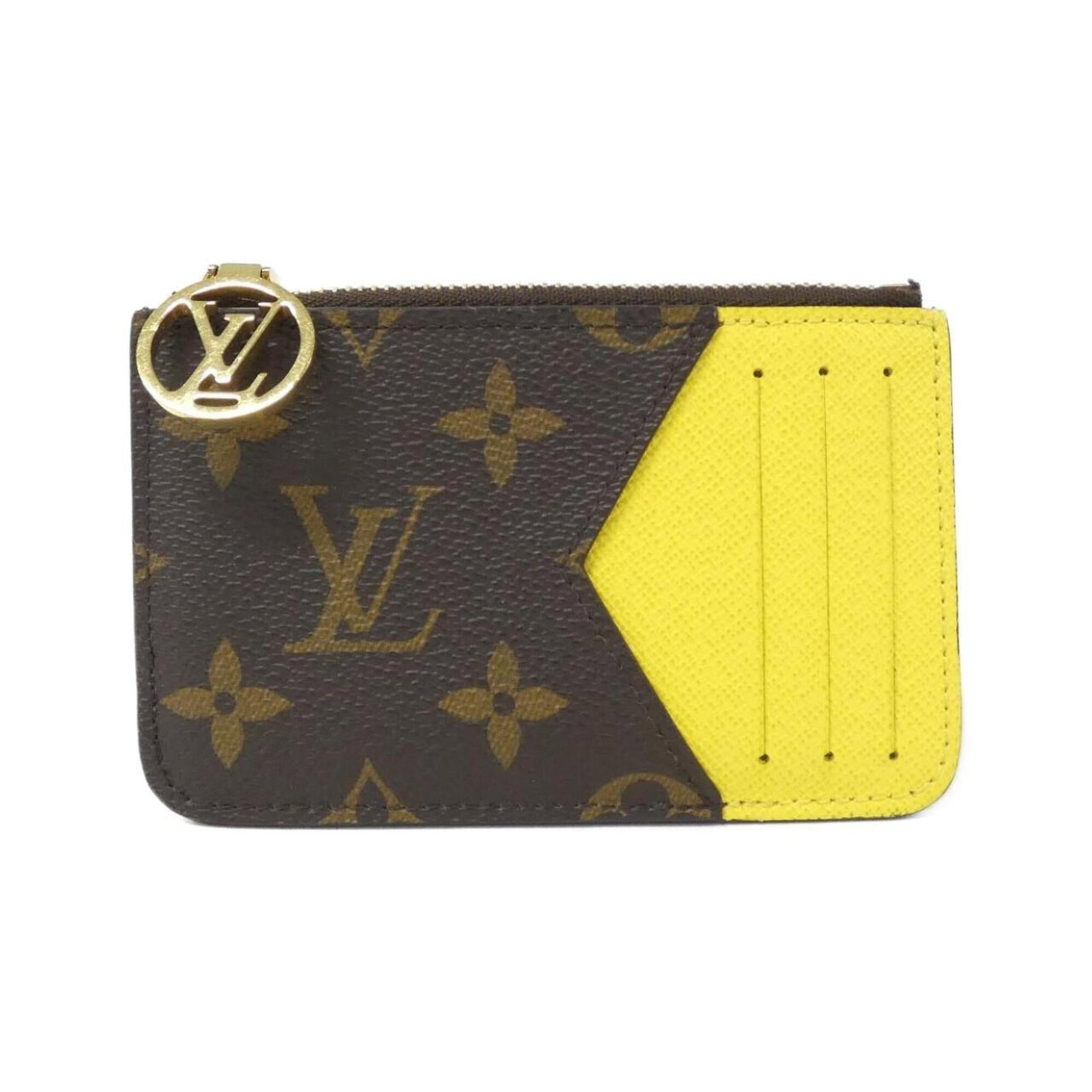 Louis Vuitton Purse Coin Case Monogram: Louis Vuitton Purse Coin Case Monogram The Louis Vuitton Purse Coin Case Monogram boasts its iconic monogram pattern in Jaune and Marron hues, adding a touch of sophistication to any accessory