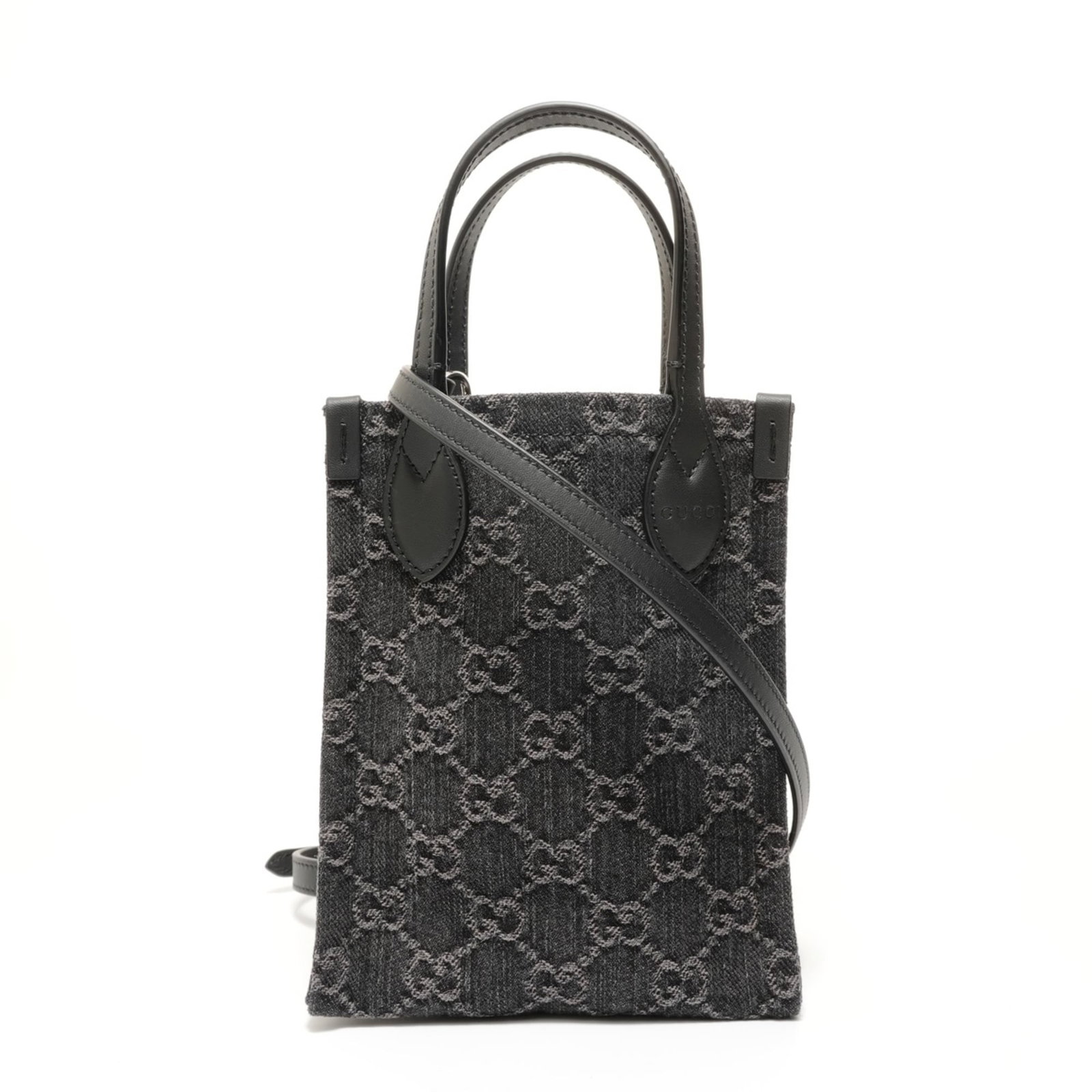 Handbag Denim: Handbag Denim Gucci's Handbag Denim boasts a striking black color and durable denim material, making it a unique accessory for women. Measuring 19cm x 14.5cm x 7cm, the bag features adjustable straps