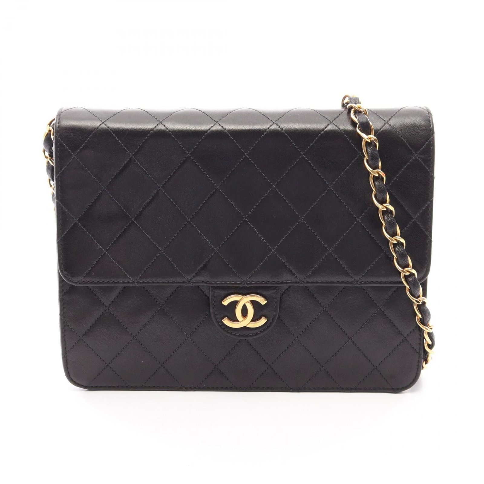 Chanel Handbag Shoulder Bag Leather: Chanel Handbag Shoulder Bag Leather Black lambskin leather, gold hardware, and classic Matelasse design make this Chanel shoulder bag a timeless accessory. Measuring 17.5cm x 22cm x 6cm, it features a