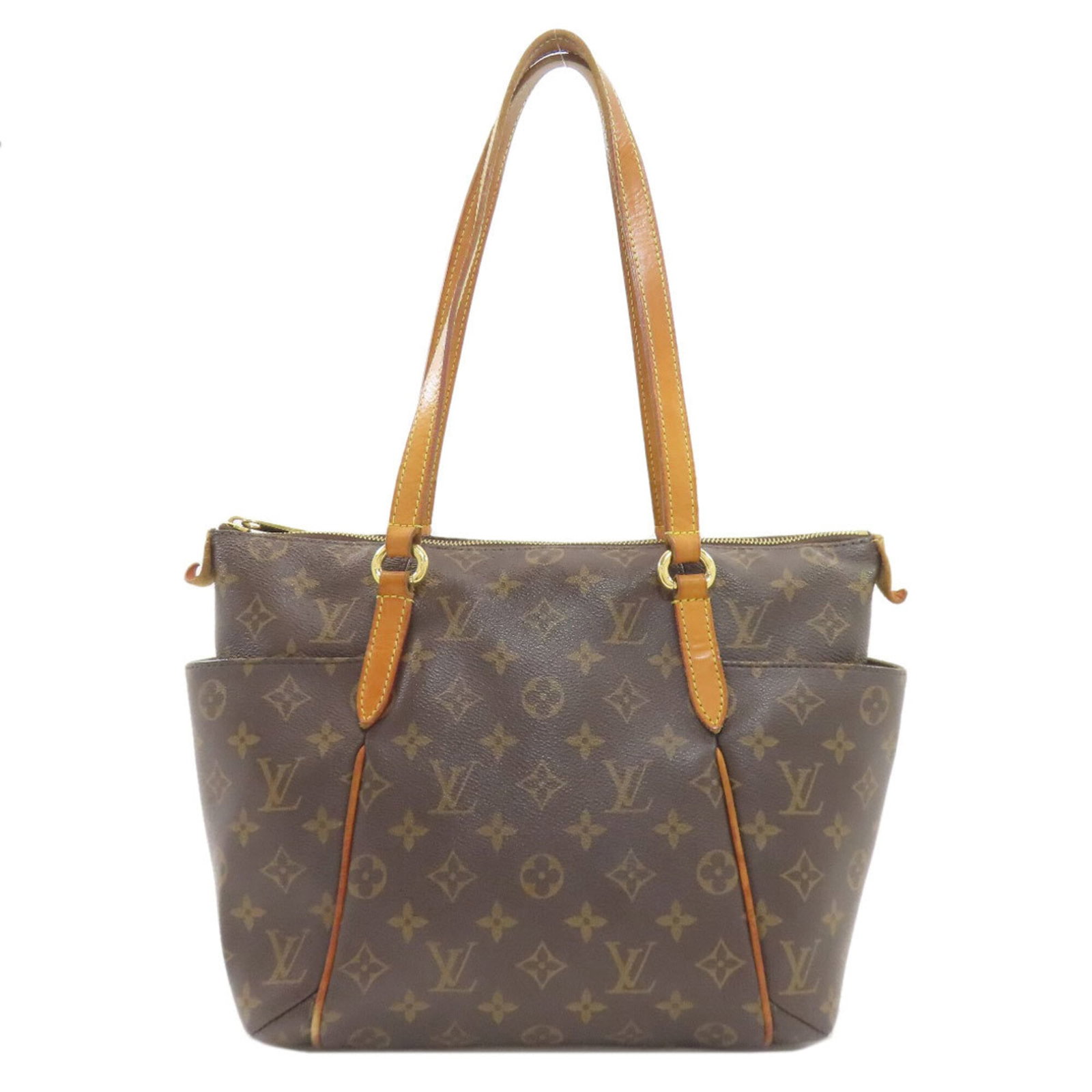 Vuitton Bag Monogram Louis: Vuitton Bag Monogram Louis Monogram Louis Vuitton tote bag features the iconic monogram pattern, a timeless design element of the brand. Made from high-quality material, this bag boasts a classic