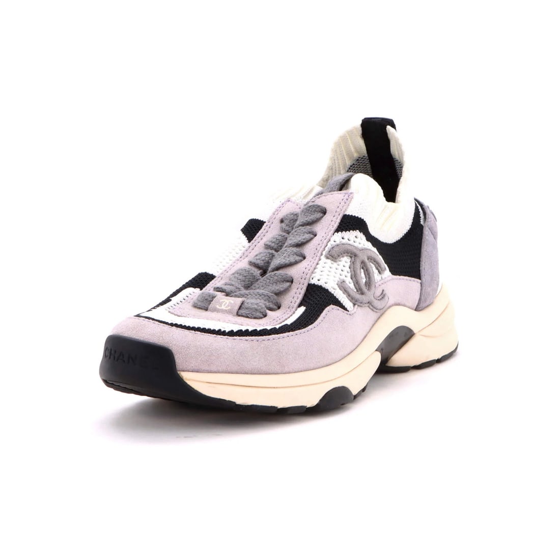 Women's Low Top Sneakers Suede Mesh: Women's Low Top Sneakers Suede Mesh Gray suede and mesh low-top sneakers from Chanel's Women's CC Low-Top Sneakers. Featuring a sleek design with mesh and suede exterior, these shoes have a white inte