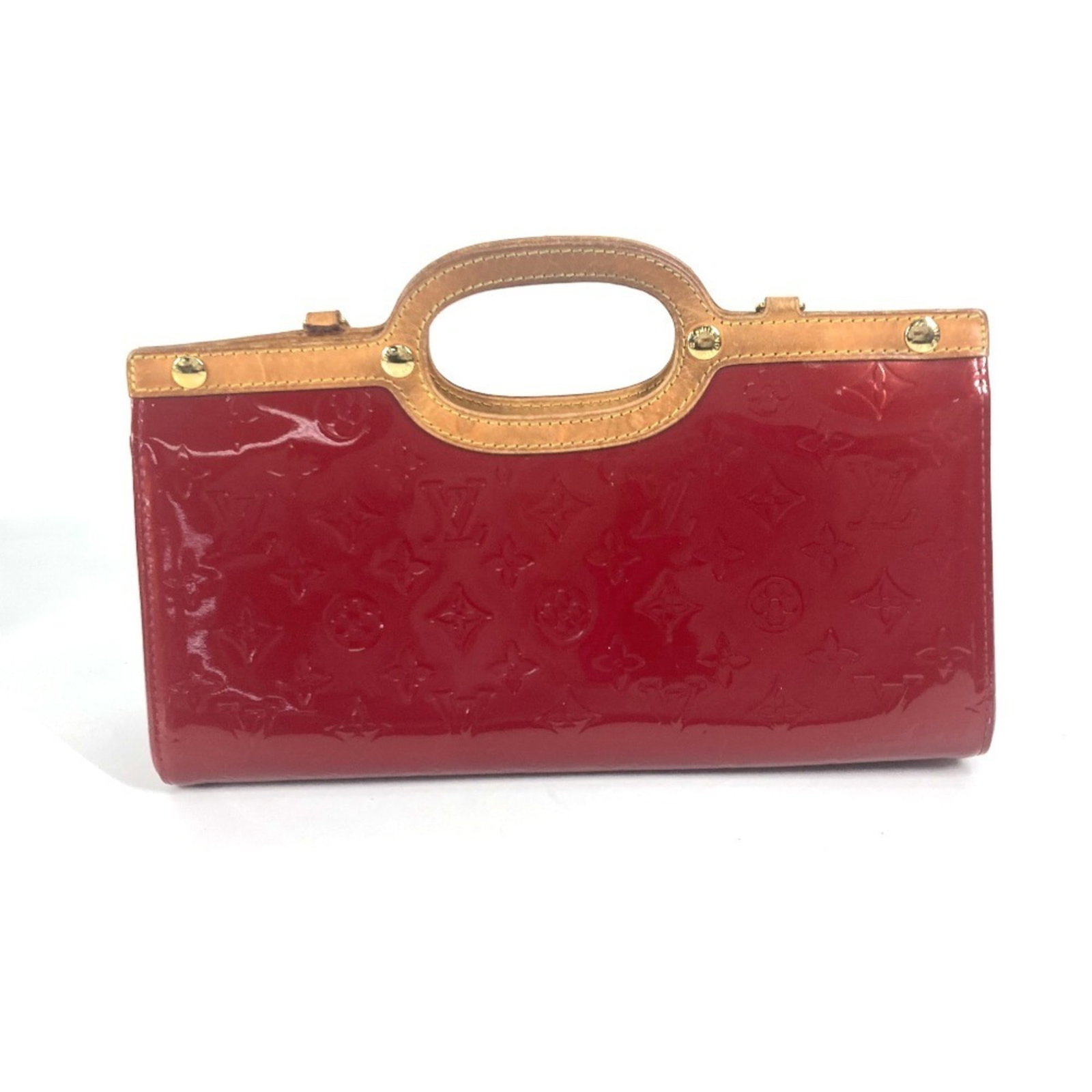 Louis Vuitton Handbag Monogram Vernis: Louis Vuitton Handbag Monogram Vernis Monogram Vernis handbag in vibrant red color, featuring the iconic Louis Vuitton design. This stylish bag measures 16.5cm x 31.5cm x 10cm and boasts a sleek