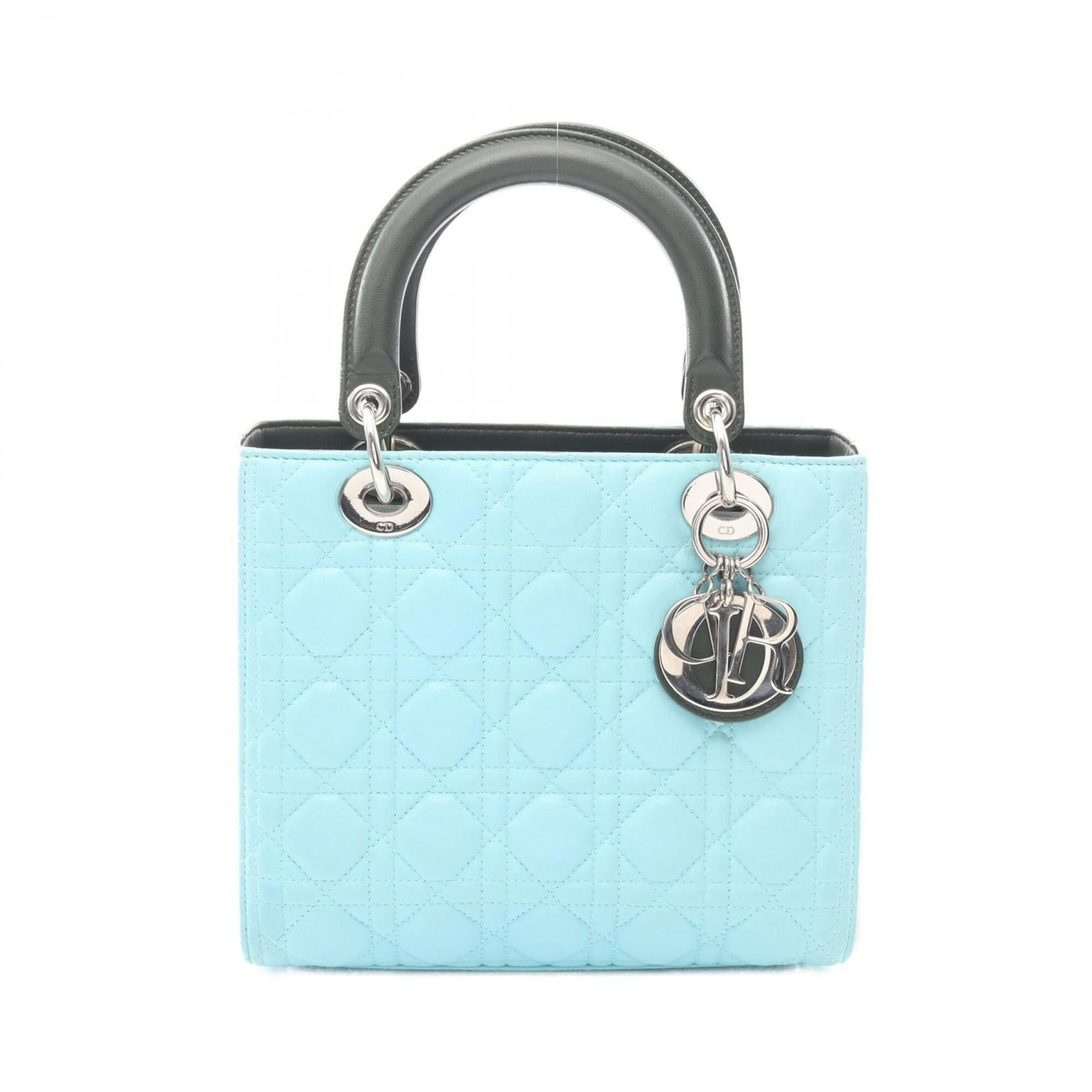 Handbag Christian Dior Leather: Handbag Christian Dior Leather Christian Dior Leather Handbag. This blue, green, and ivory leather handbag measures 20cm x 24cm x 11cm and features a classic design. The bag's luxurious material and