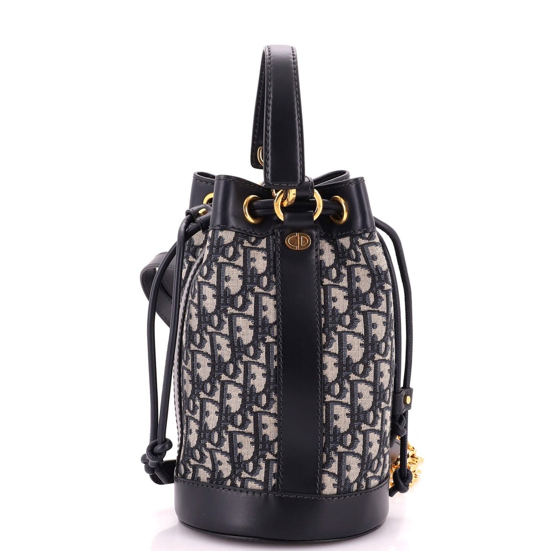 Christian Dior Small Oblique Canvas Backpack Drawstring: Christian Dior Small Oblique Canvas Backpack Drawstring The Christian Dior Small Oblique Canvas Backpack Drawstring boasts a stylish blue canvas exterior with subtle leather accents, adding a touch of