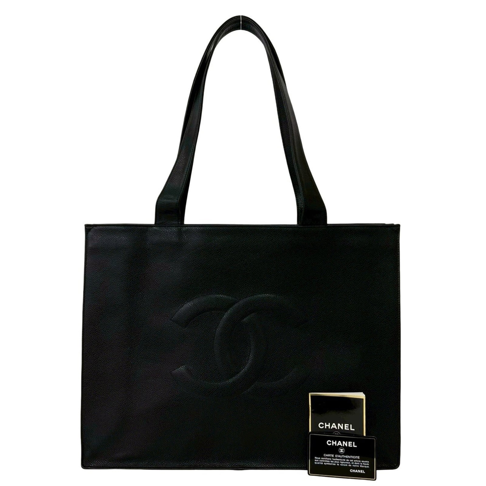 Calfskin bag tote by Chanel: Calfskin bag tote by Chanel Black Grained Calfskin Tote Bag by Chanel, measuring 31.5cm x 41.5cm x 11.5cm in size. This stylish tote bag features high-quality materials and a classic design that exude