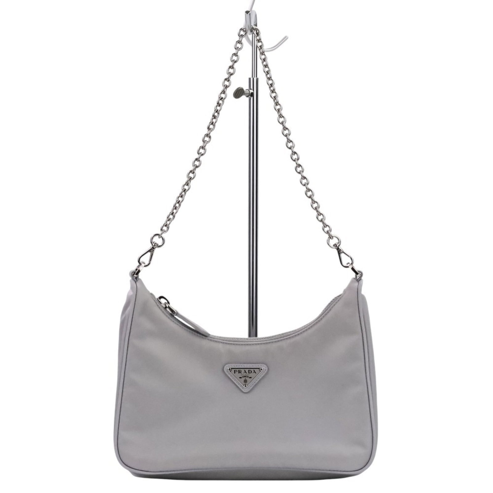 Shoulder Bag: Shoulder Bag Light blue Prada shoulder bag with a classic design, featuring a signature and dimensions of 16.5cm x 22cm x 6cm. The bag has adjustable straps that can be set to 78cm - 108cm in length,