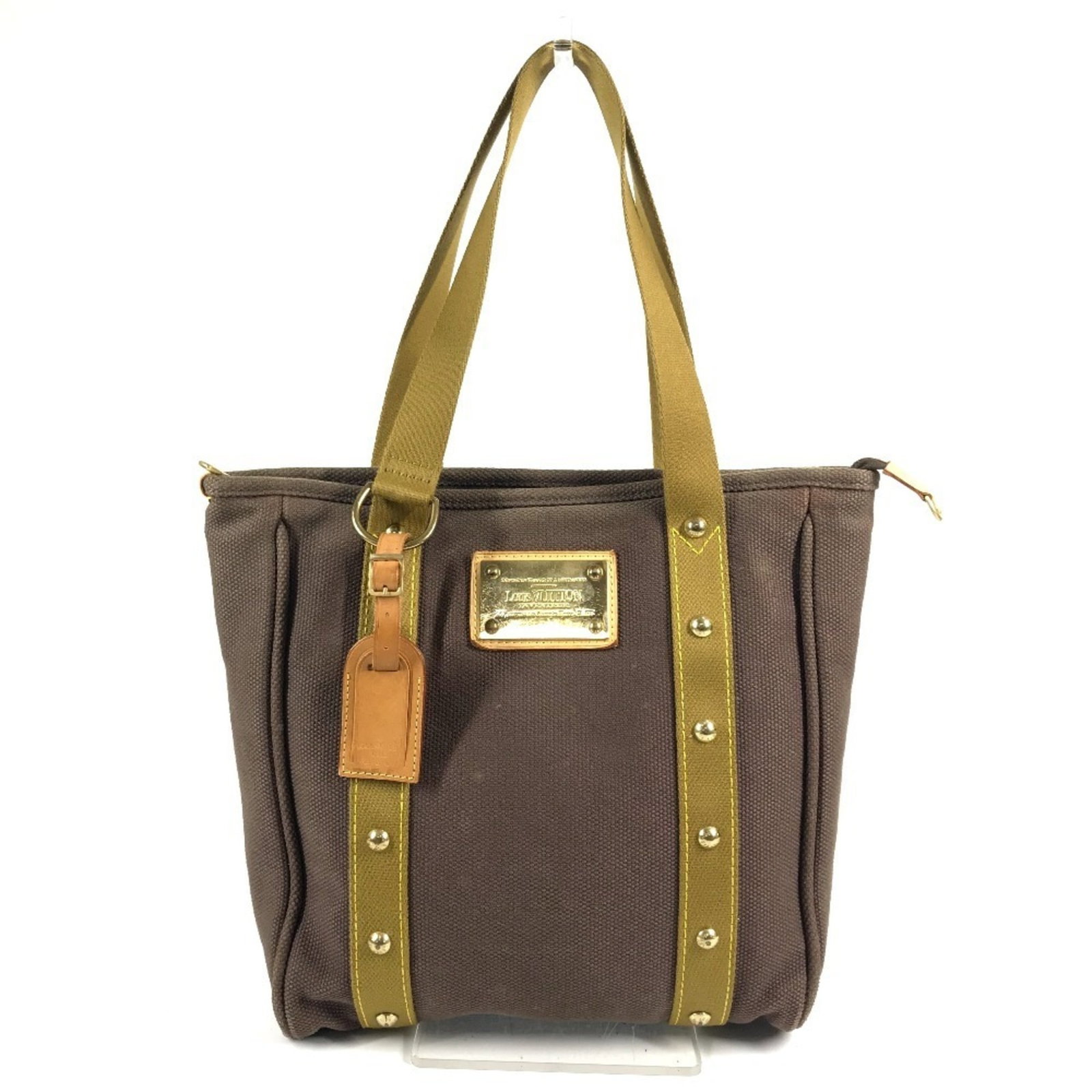 Canvas Leather Louis Tote Vuitton Bag Shoulder: Canvas Leather Louis Tote Vuitton Bag Shoulder Canvas Leather Louis Tote Vuitton Bag Shoulder - A classic shoulder tote with a timeless design, featuring canvas and leather materials in a rich brown