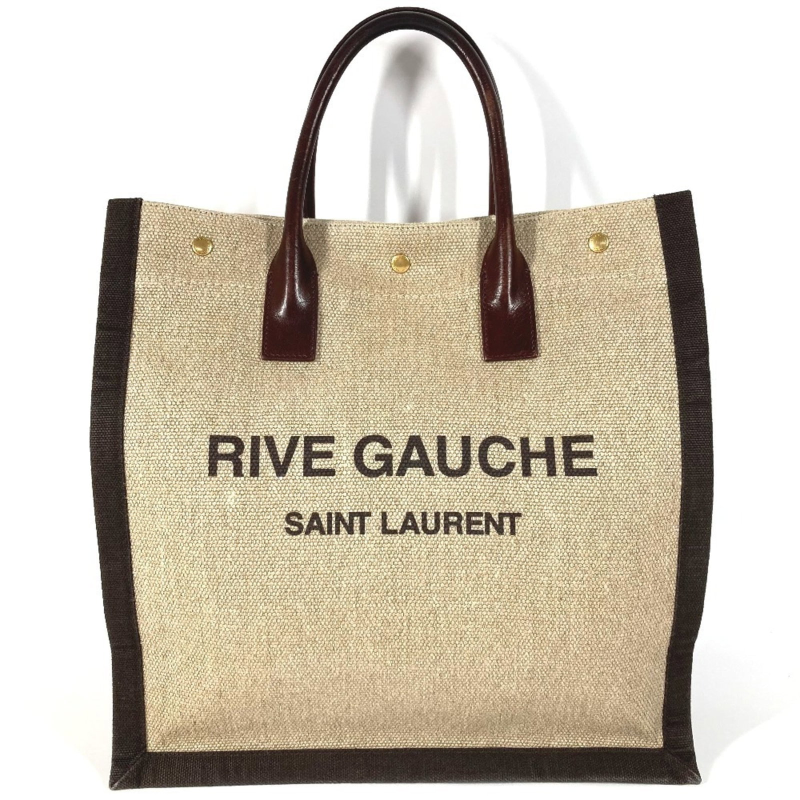 Saint Laurent Yves Handbag Leather Tote Linen Bag Shoulder: Saint Laurent Yves Handbag Leather Tote Linen Bag Shoulder Linen and leather blend in this elegant Yves Saint Laurent tote bag, featuring a timeless beige and brown color palette. Made from high-quali
