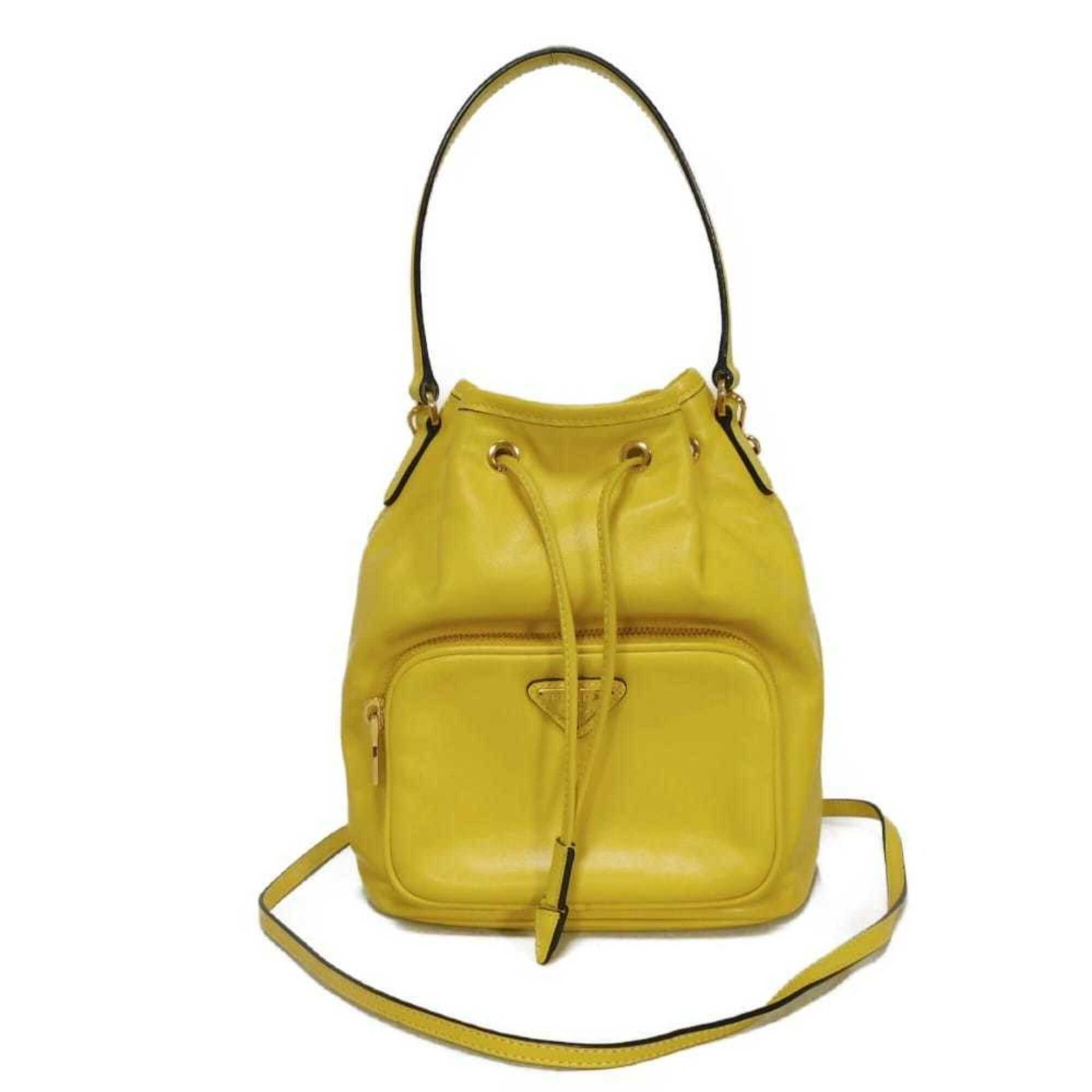 Handbag leather by Prada: Handbag leather by Prada Yellow Prada leather handbag with dimensions 23.5cm x 24cm x 12cm, bearing the brand's MPN and serial number on the interior. This men's and women's handbag is made from