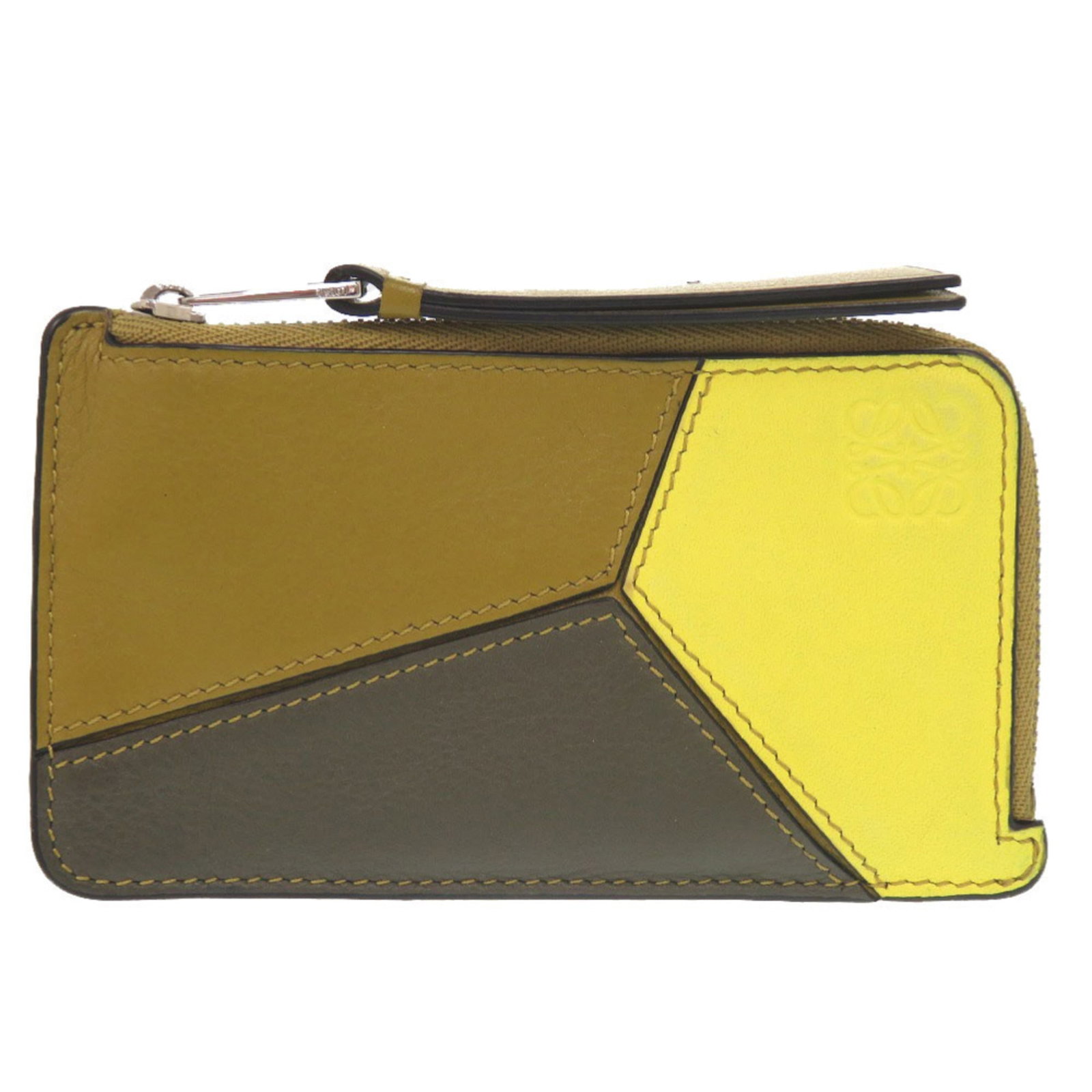 Card case leather from Loewe: Card case leather from Loewe This card case from Loewe features a unique khaki, multi-color, and yellow leather design. Made from high-quality leather, it measures 7.5cm x 13cm / 2.95'' x 5.11''. The 