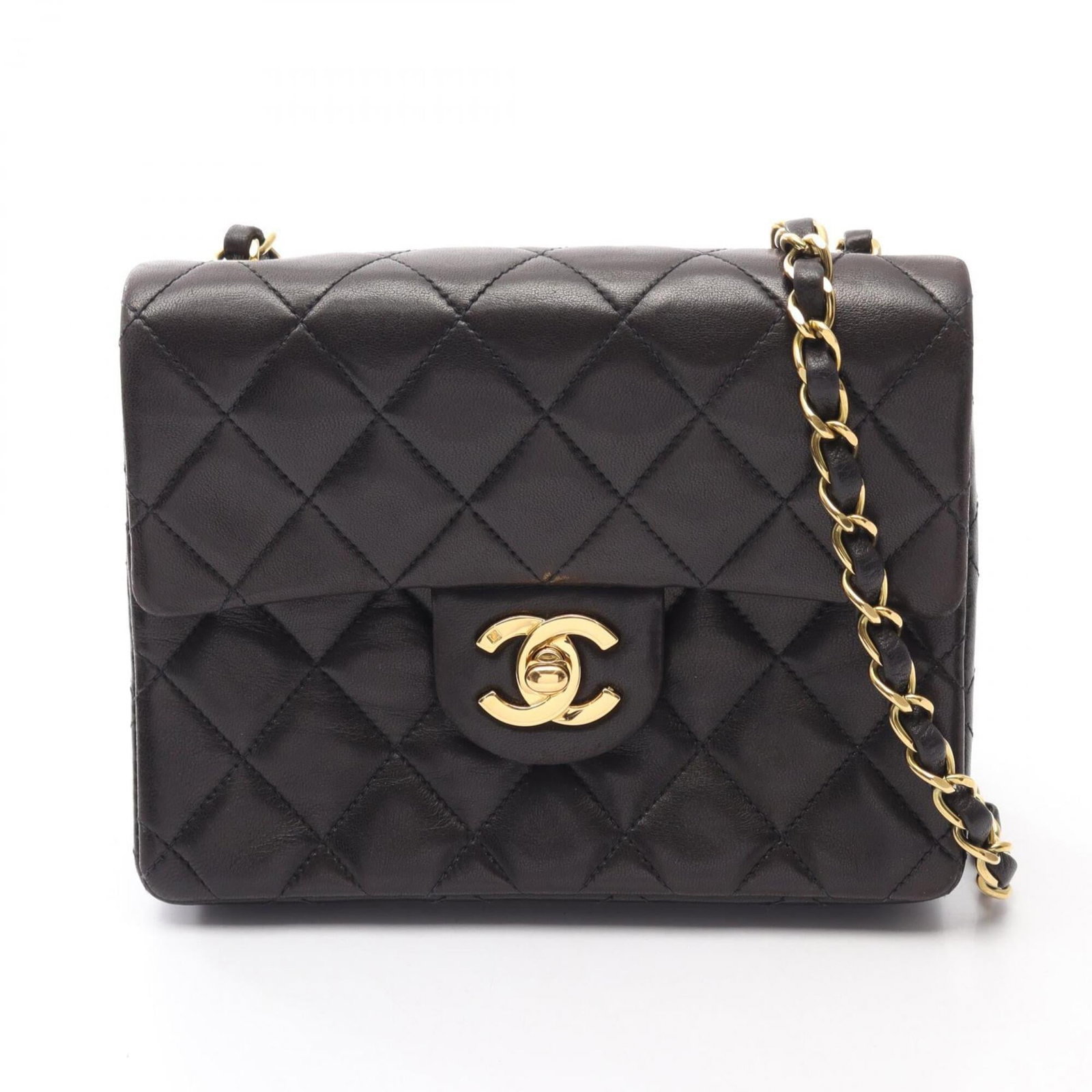 Chanel Handbag Shoulder Bag Leather: Chanel Handbag Shoulder Bag Leather Black lambskin leather Chanel shoulder bag with classic design and timeless elegance. Measuring 13cm x 17cm x 6cm, it offers a stylish and compact way to carry