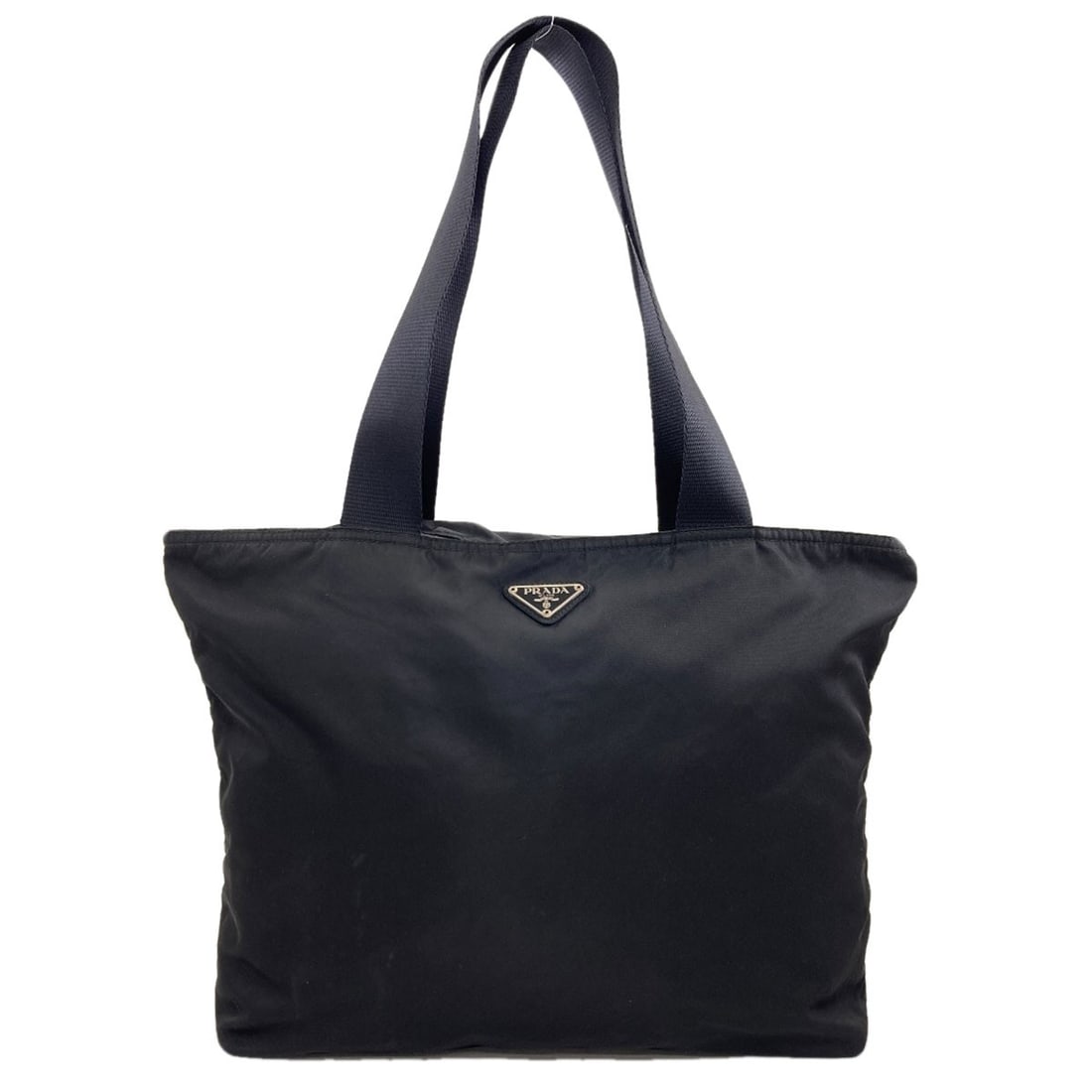 Tote Bag Prada Nylon Hardware Logo: Tote Bag Prada Nylon Hardware Logo Black Prada Nylon Tote Bag with Logo. Made from high-quality nylon, this tote bag features the iconic logo of the luxury brand PRADA. The sleek and durable design