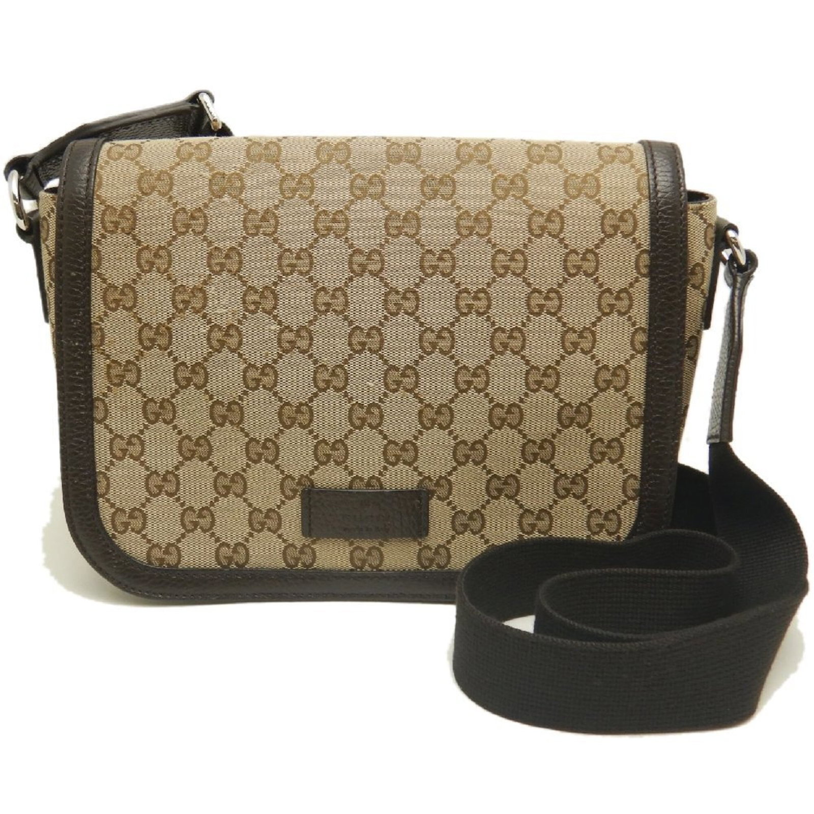 Shoulder Bag Canvas Leather Gucci: Shoulder Bag Canvas Leather Gucci The Gucci Shoulder Bag in Beige features a striking combination of GG canvas and leather, with silver hardware adding a touch of sophistication. Measuring 20cm x