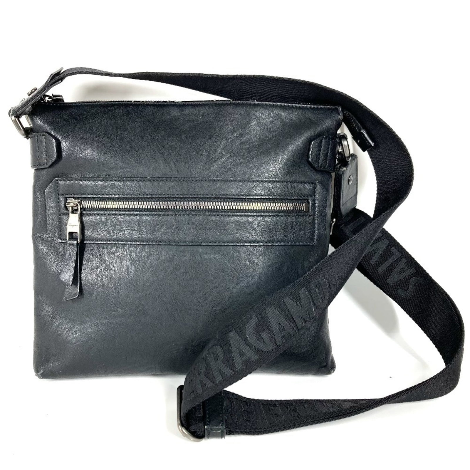 Shoulder bag leather by Salvatore Ferragamo: Shoulder bag leather by Salvatore Ferragamo Black leather shoulder bag by Salvatore Ferragamo, crafted in Italy with dimensions of 24cm x 26cm x 3cm. This sleek and stylish accessory features high-qua