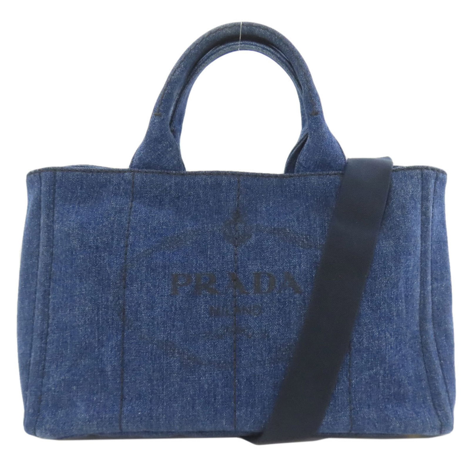 Denim Handbag Prada: Denim Handbag Prada Denim Prada handbag in blue, measuring 23cm x 35cm x 23cm. Features a denim material and adjustable strap length from 84cm to 127cm. Made by the renowned Italian fashion house