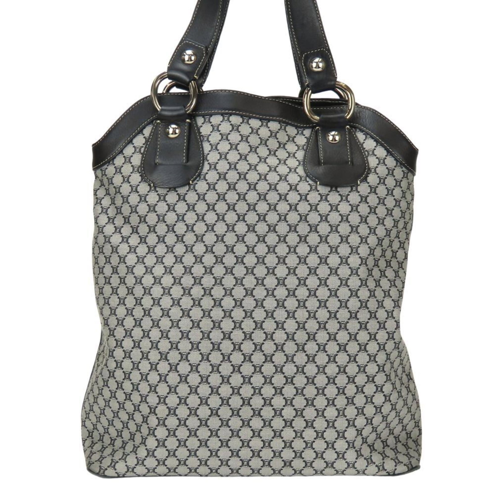 Canvas leather tote bag Celine: Canvas leather tote bag Celine Canvas leather tote bag from the Celine Macadam line, featuring a sleek black and gray design with a magnetic closure. This stylish and functional bag measures 34cm x