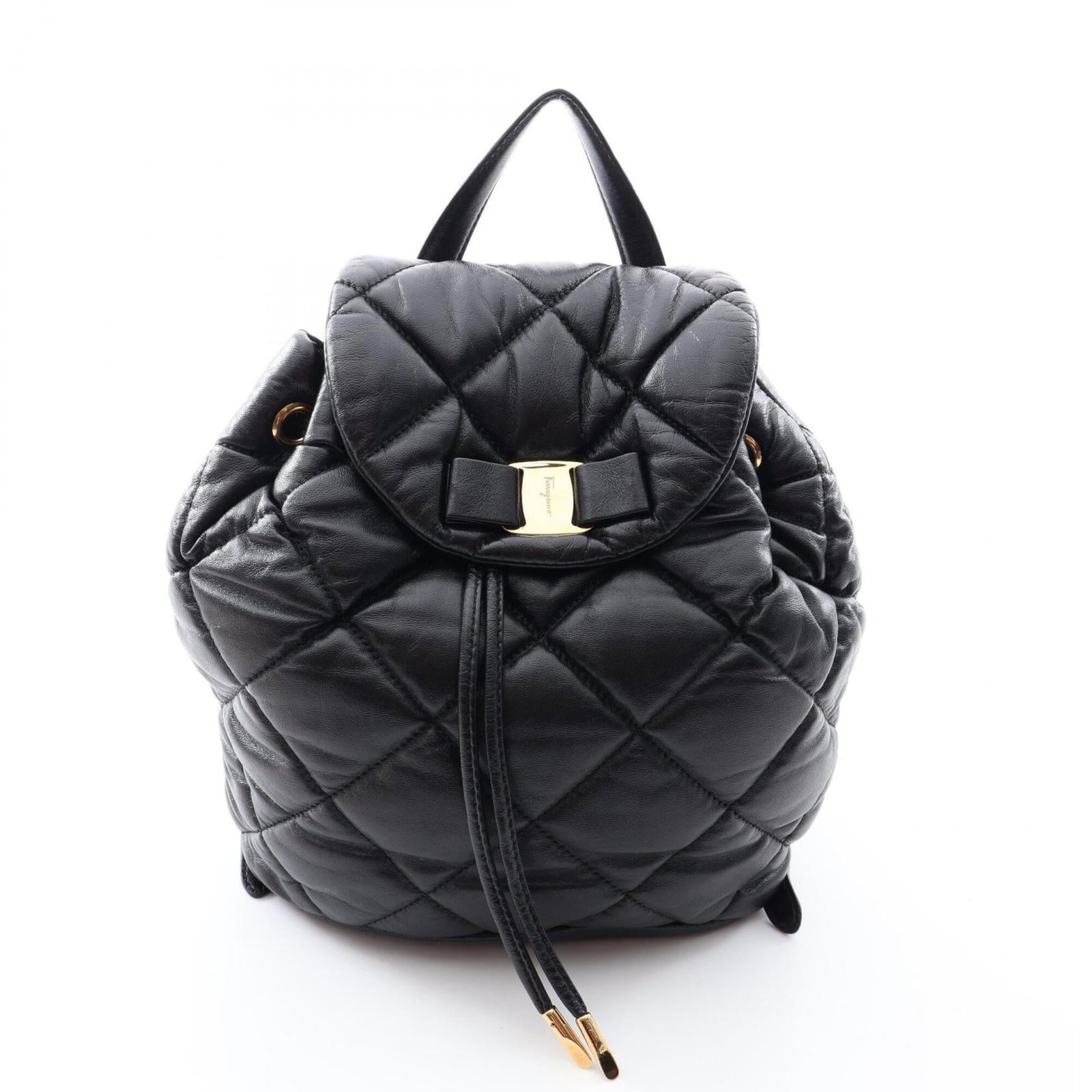 Salvatore Ferragamo Leather Backpack Handbag: Salvatore Ferragamo Leather Backpack Handbag The Salvatore Ferragamo Leather Backpack Handbag boasts sleek black leather construction, measuring 27cm x 20cm x 12cm. This stylish backpack features a