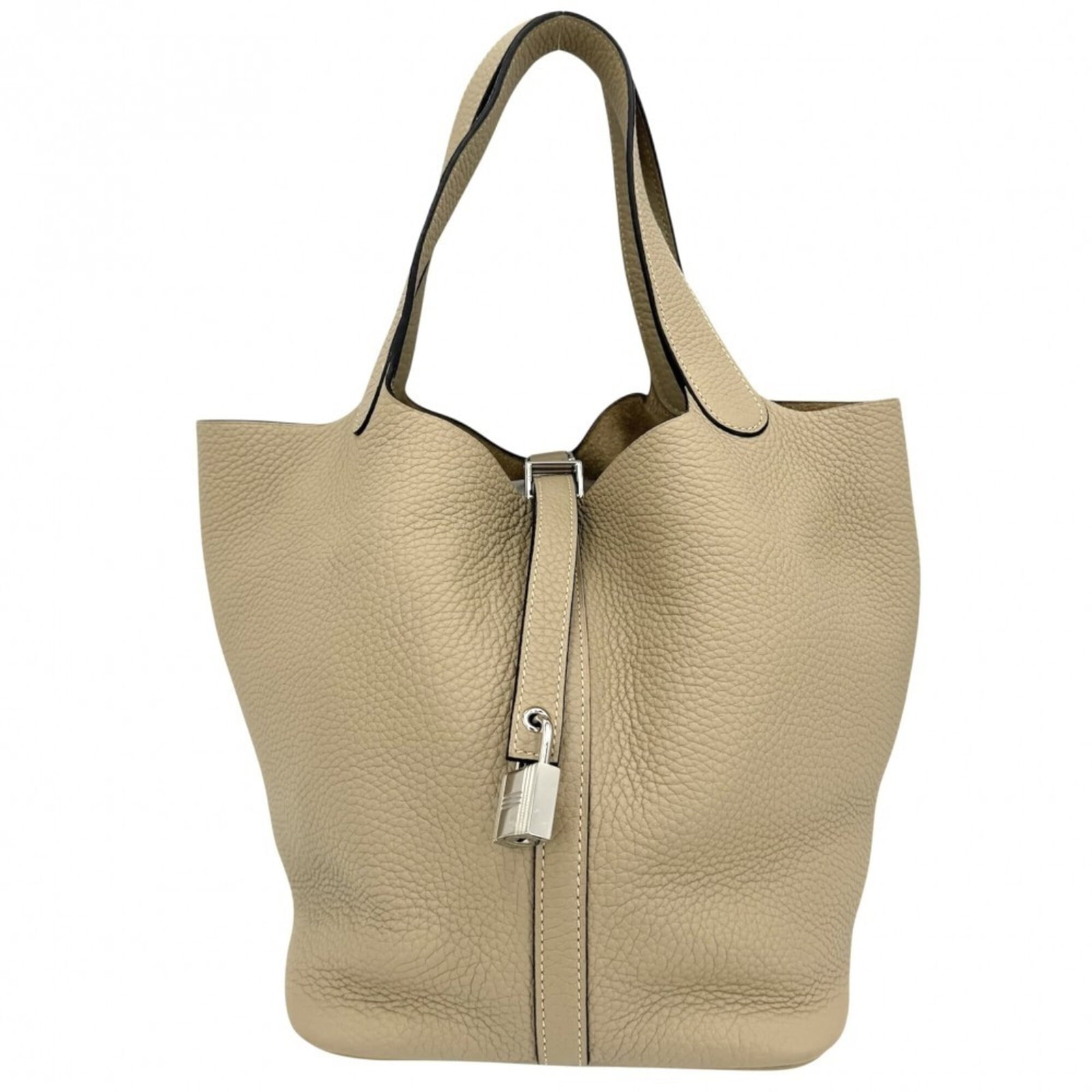 Handbag by Hermes: Handbag by Hermes This exquisite beige Herm?s handbag boasts classic design and refined proportions, with clean lines and subtle details. Measuring 22cm x 18cm x 22cm, it offers a stylish and compact 