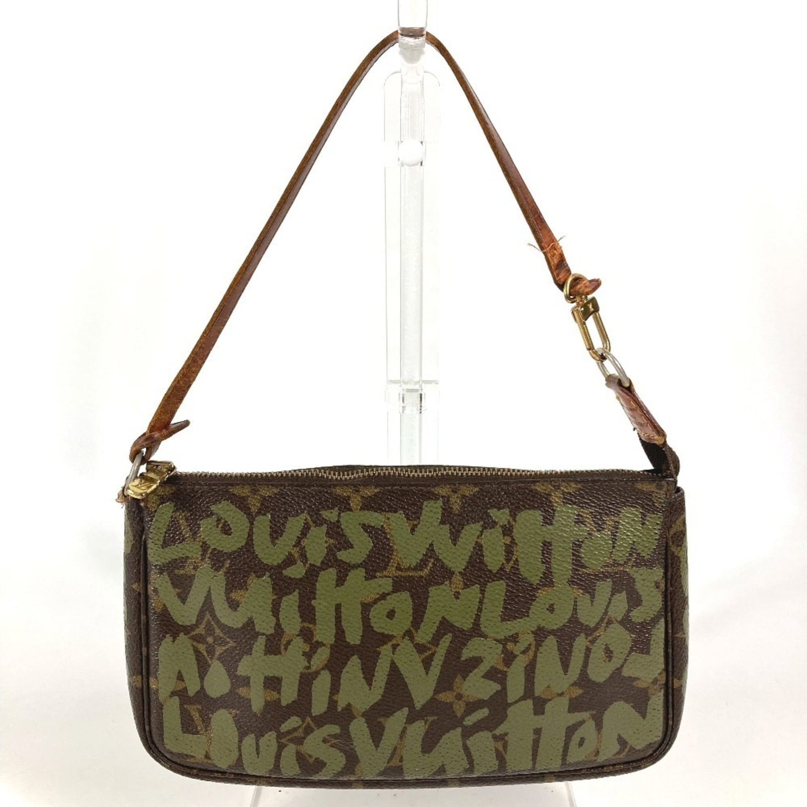 Louis Vuitton Monogram Graffiti Canvas Pochette Pouch Shoulder Bag: Louis Vuitton Monogram Graffiti Canvas Pochette Pouch Shoulder Bag Monogram Graffiti Canvas Pochette Pouch Shoulder Bag from Louis Vuitton features the iconic Monogram Graffiti pattern in brown and