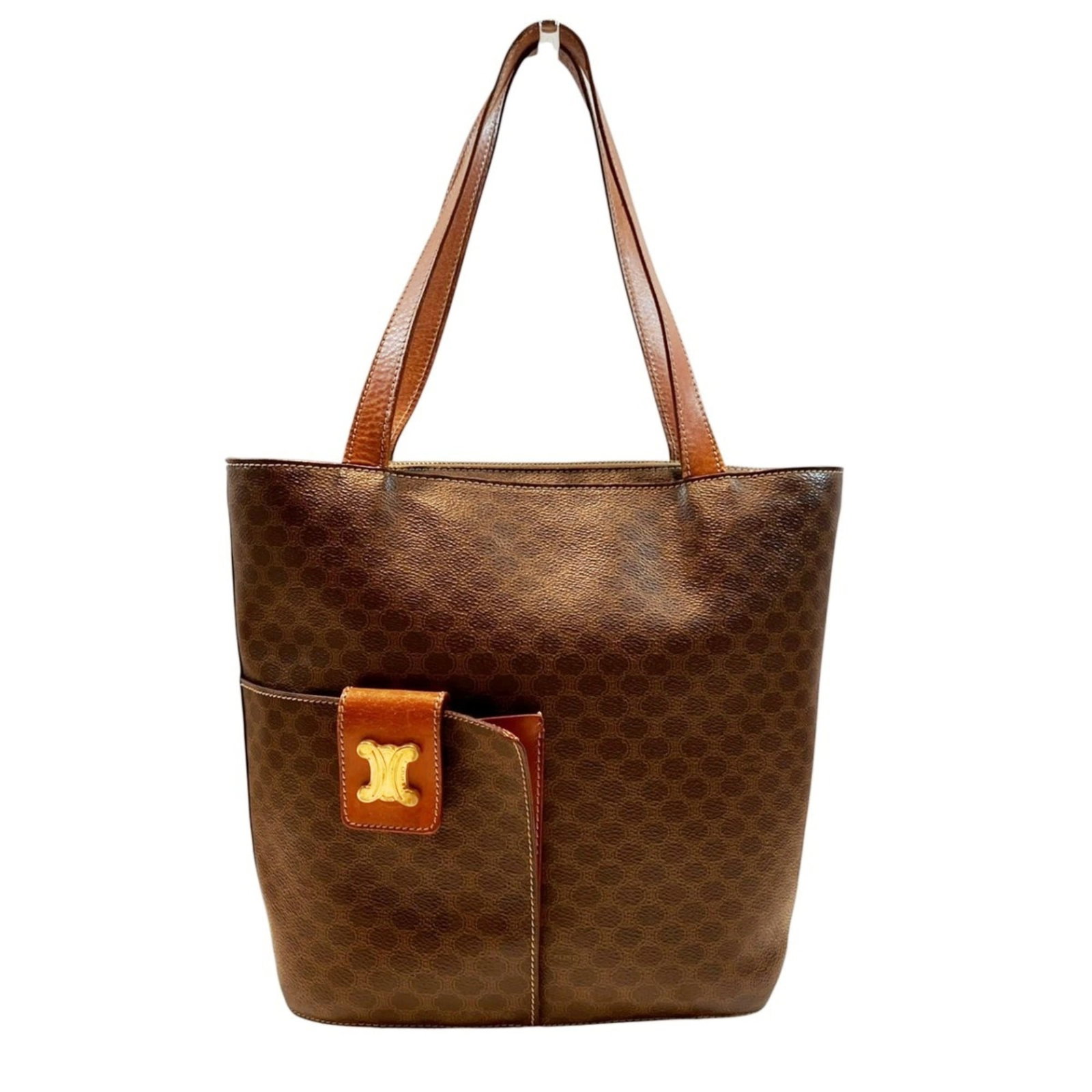 Leather PVC tote bag: Leather PVC tote bag This Celine leather PVC tote bag boasts a rich brown color and sturdy design, with precise measurements at 27cm x 28cm x 10cm. The combination of high-quality leather and durable 