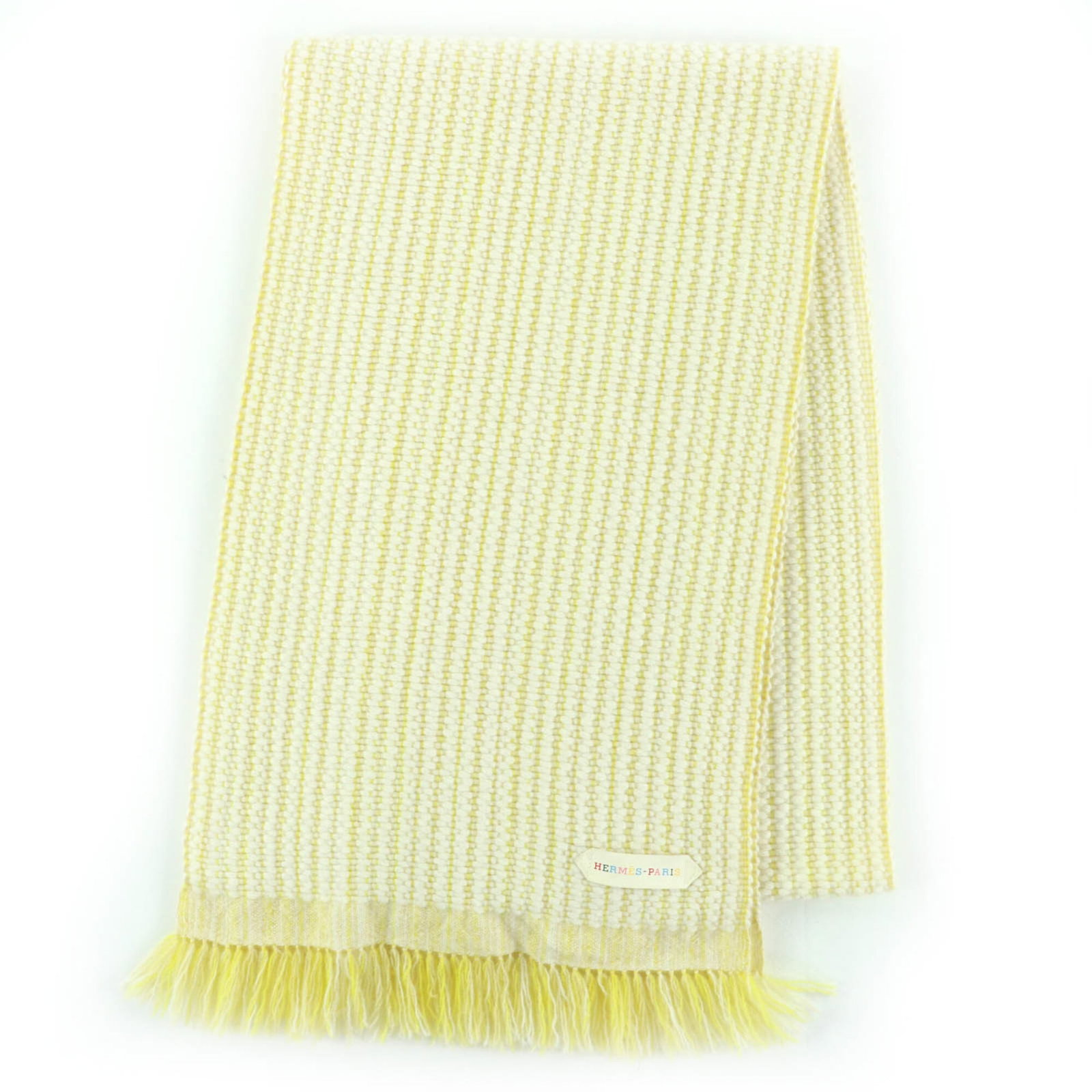 Cashmere Stole by Hermes: Cashmere Stole by Hermes Yellow cashmere stole by Hermes, measuring 1.88m x 29cm, made from 100% cashmere material. This stunning piece boasts a vibrant yellow color and showcases the craftsmanship of
