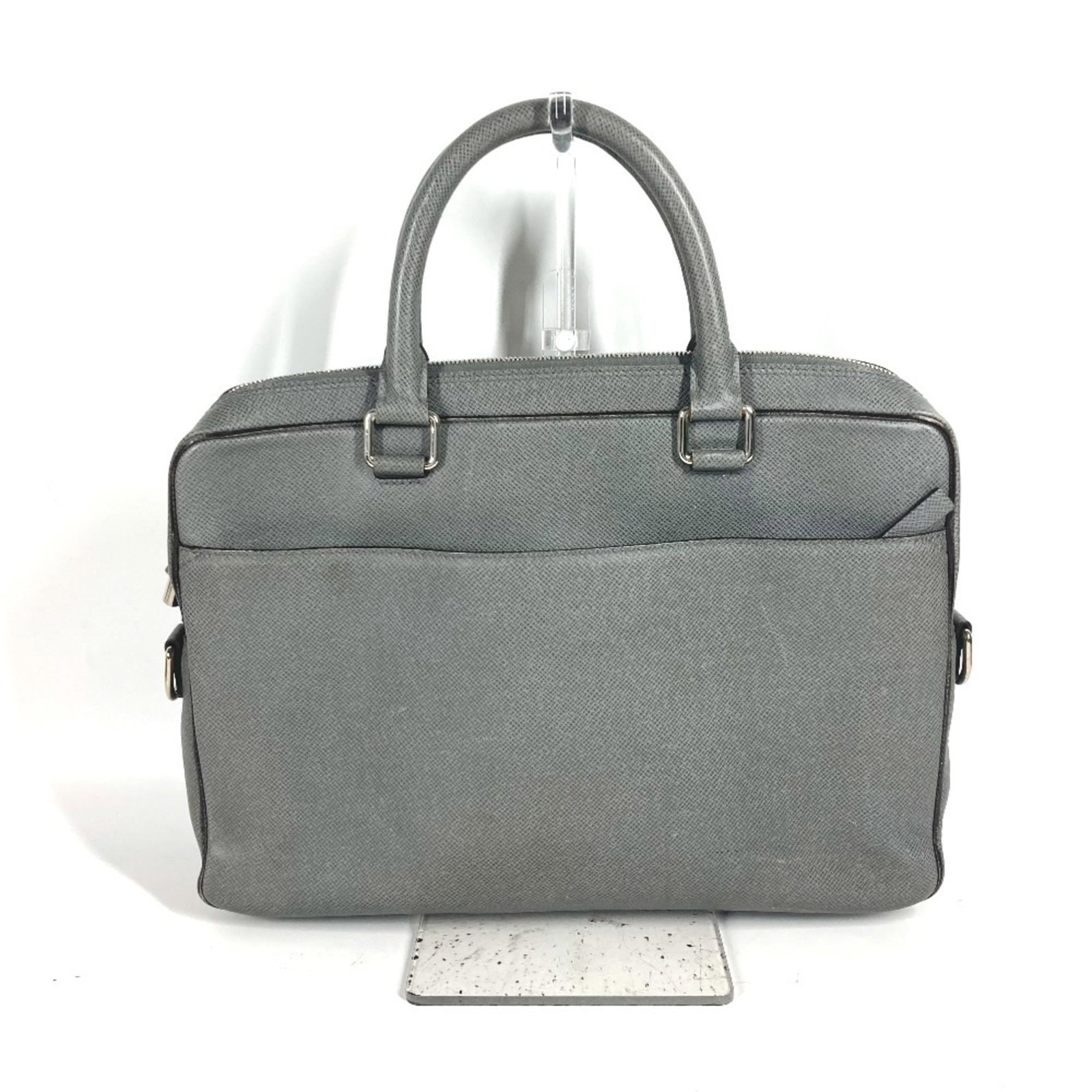 Taiga leather briefcase by Louis Vuitton: Taiga leather briefcase by Louis Vuitton Taiga leather briefcase by Louis Vuitton, featuring Glacier and Gray taiga leather colors. This men's and women's briefcase measures 25cm x 36.5cm x 6cm and is