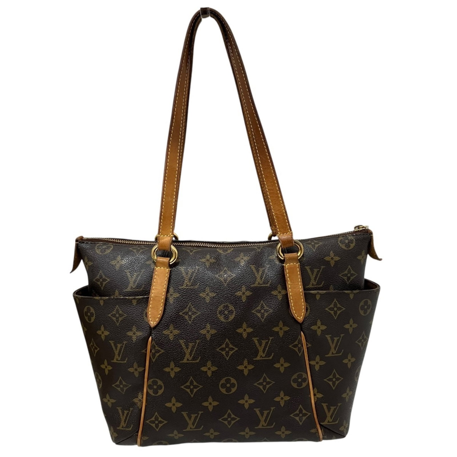 Louis Vuitton Tote Bag Pvc: Louis Vuitton Tote Bag Pvc The Louis Vuitton Tote Bag Pvc boasts a sleek, brown PVC design with a classic tote shape. Measuring 26cm x 28cm x 13.5cm, it offers a compact and stylish storage solution.