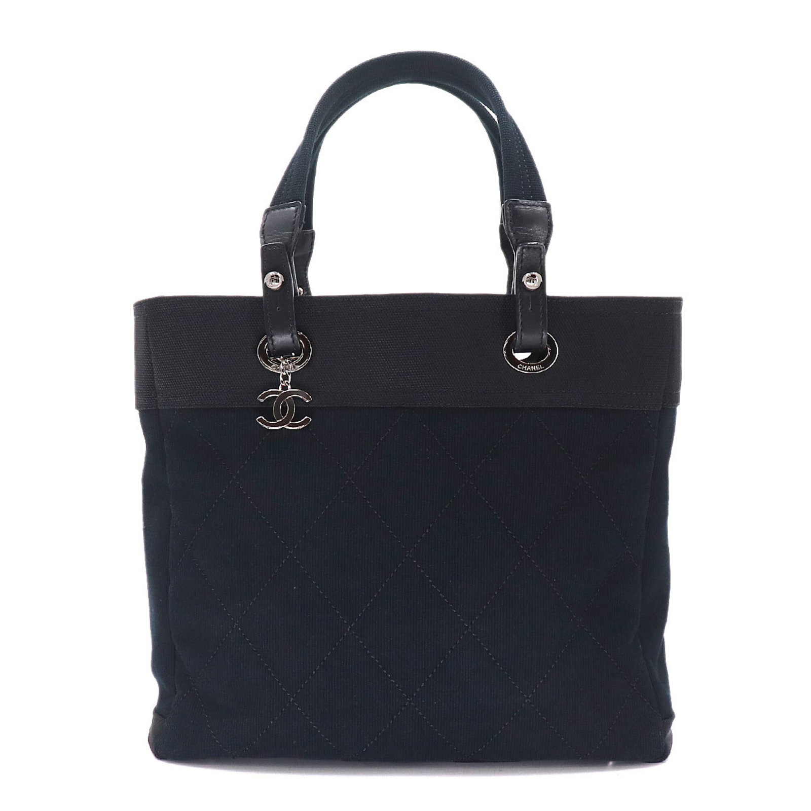 Chanel Handbag Tote Bag Canvas: Chanel Handbag Tote Bag Canvas Canvas Tote Bag from Chanel, crafted in Italy with a sleek black finish. Measuring 30.5cm x 34cm x 13cm, this tote bag features a classic design that exudes timeless ele