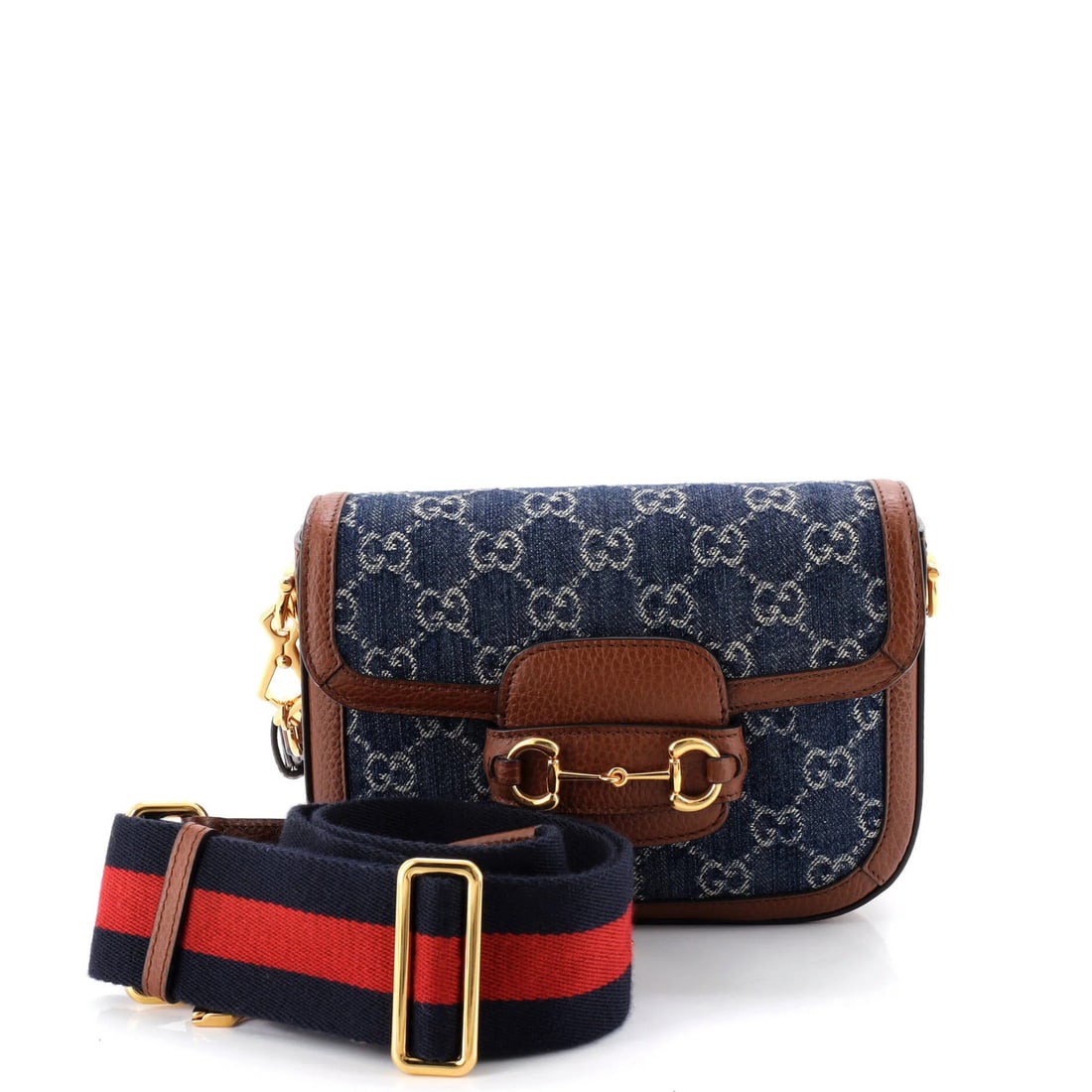 Gucci Horsebit 1955 Shoulder Bag GG Denim Mini: Gucci Horsebit 1955 Shoulder Bag GG Denim Mini Gucci Horsebit 1955 Shoulder Bag GG Denim Mini boasts a unique blend of classic style and denim charm. This iconic mini shoulder bag features a