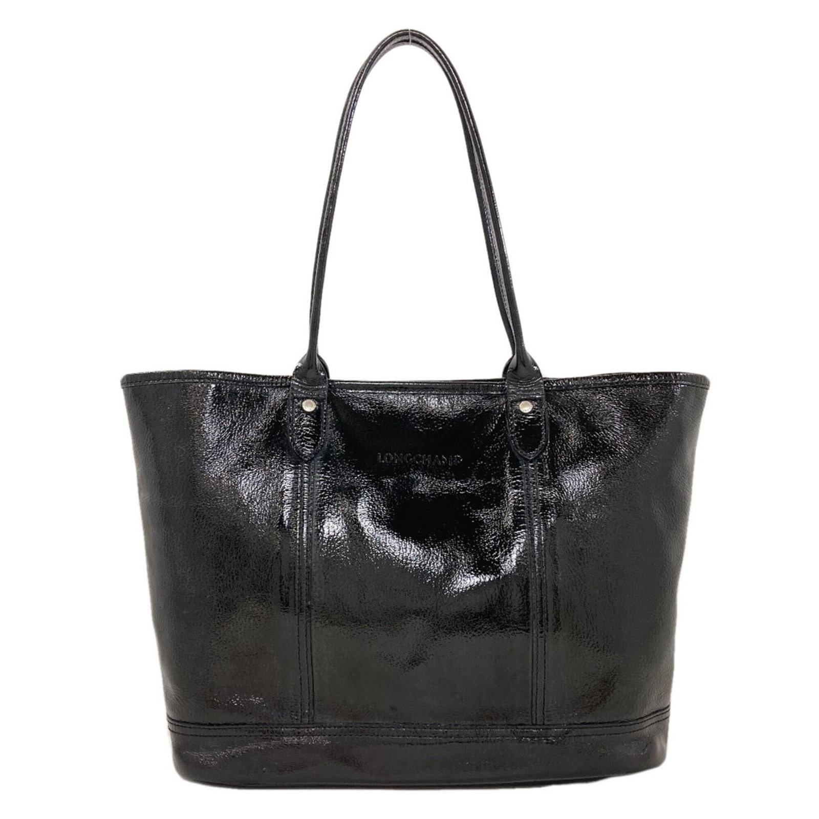 Patent Leather Tote Bag By Longchamp: Patent Leather Tote Bag By Longchamp Patent leather tote bag by Longchamp in black, featuring a sleek and sophisticated design. Made from high-quality patent leather, this bag boasts a classic style
