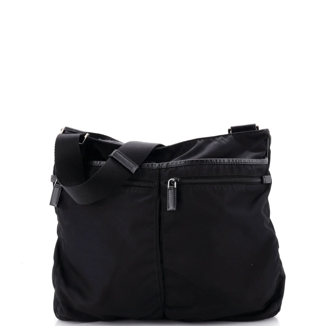 Tessuto medium pocket messenger bag by Prada: Tessuto medium pocket messenger bag by Prada Tessuto medium pocket messenger bag by Prada boasts a sleek black nylon exterior with subtle wear and minor discoloration. The interior features a light od