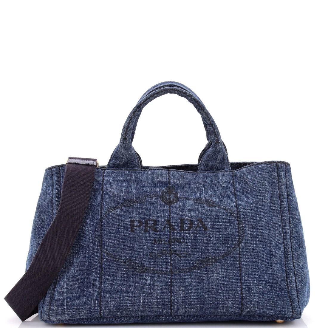Convertible Tote Canapa Medium Prada Denim: Convertible Tote Canapa Medium Prada Denim Blue Canapa Convertible Tote in Medium Denim, featuring gold hardware and a spacious interior. This versatile Prada tote boasts a durable denim exterior