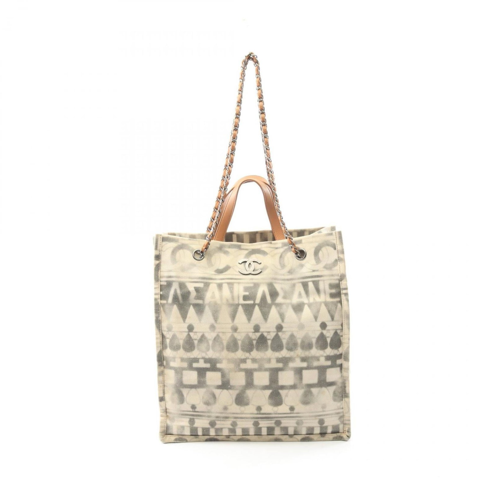 Chanel Tote Bag Canvas Leather: Chanel Tote Bag Canvas Leather Canvas and leather come together in this understated Chanel tote bag, available in beige and brown hues. Measuring 35cm x 32cm x 15cm, it offers a compact size for