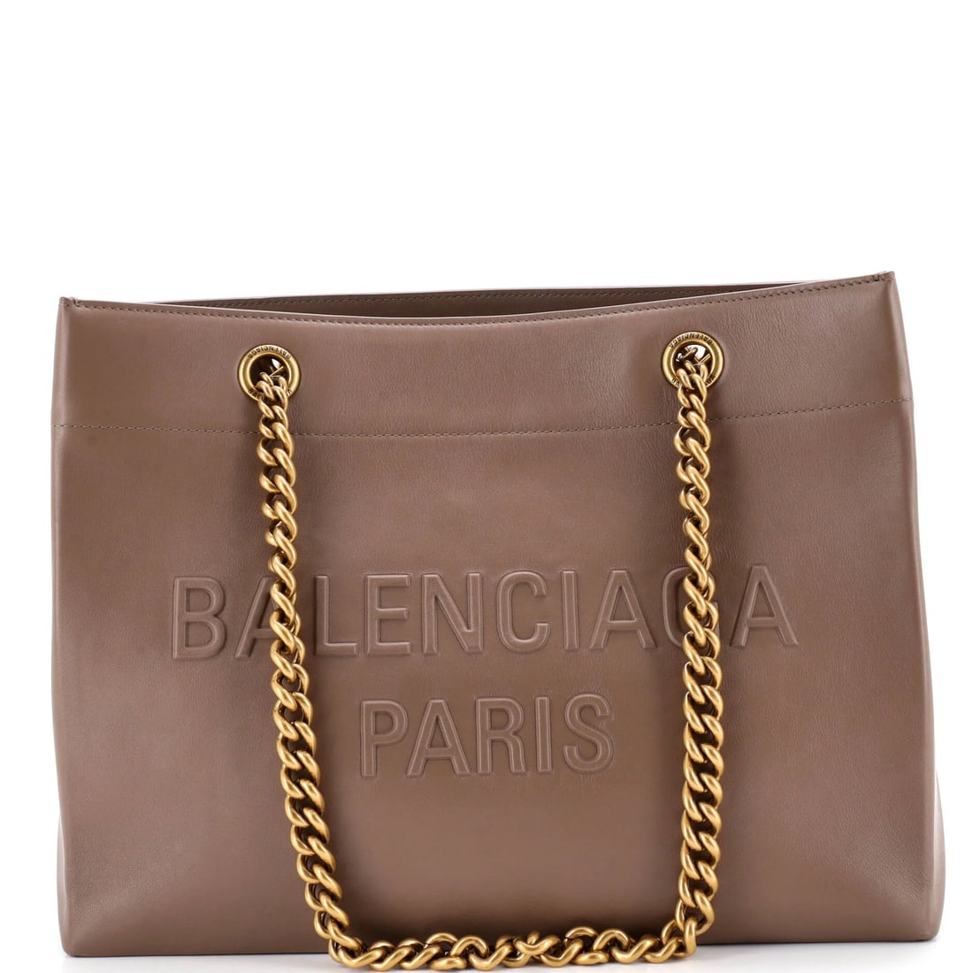 Free Chain Leather Duty Medium Tote Balenciaga: Free Chain Leather Duty Medium Tote Balenciaga Balenciaga's Duty Free Chain Tote in Brown Leather boasts a classic medium size with a sturdy design, measuring 10.5" tall and 13.5" wide. The exterior f