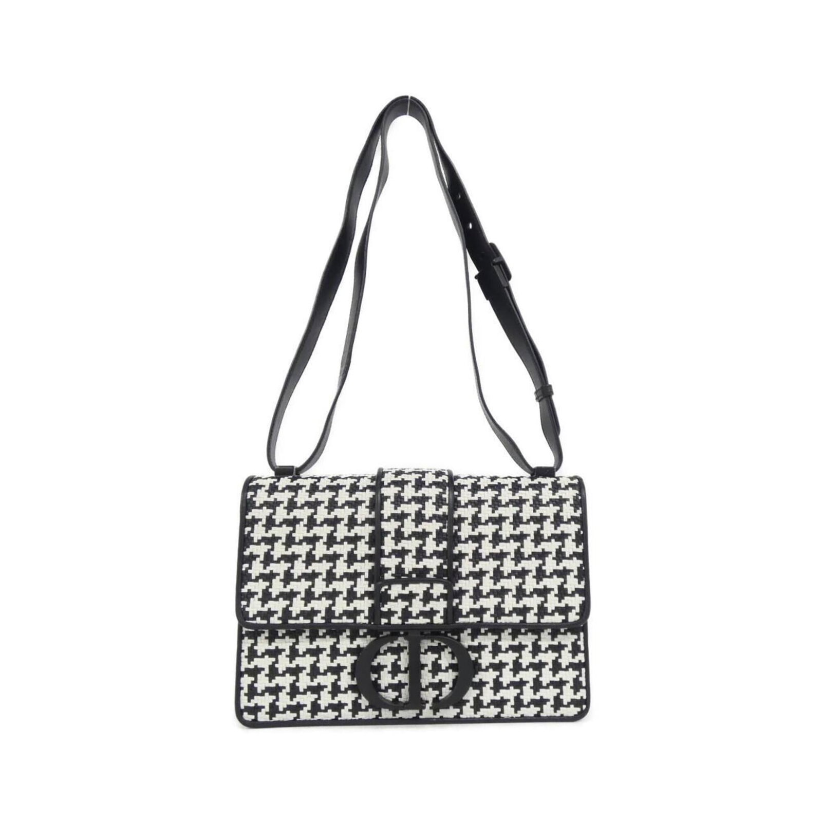 Shoulder bag leather by Christian Dior: Shoulder bag leather by Christian Dior This black leather shoulder bag by Christian Dior measures 17cm x 24cm x 7cm and features a sleek, modern design. Crafted from high-quality leather, the bag's cl