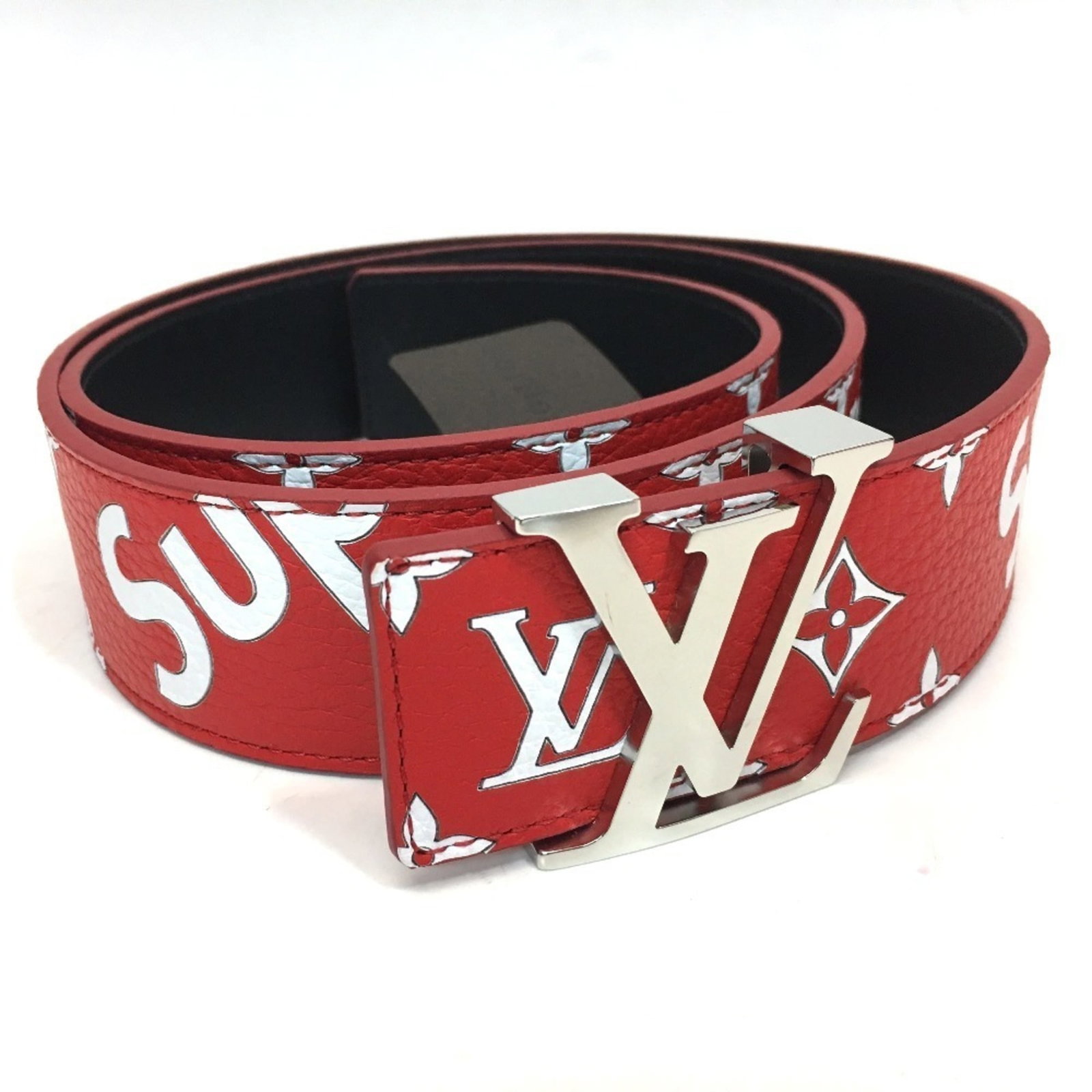 Louis Vuitton Standard Belt: Louis Vuitton Standard Belt Red leather standard belt from Louis Vuitton, accompanied by a box and dust bag. This classic accessory features the iconic brand's signature style. A stylish addition to a
